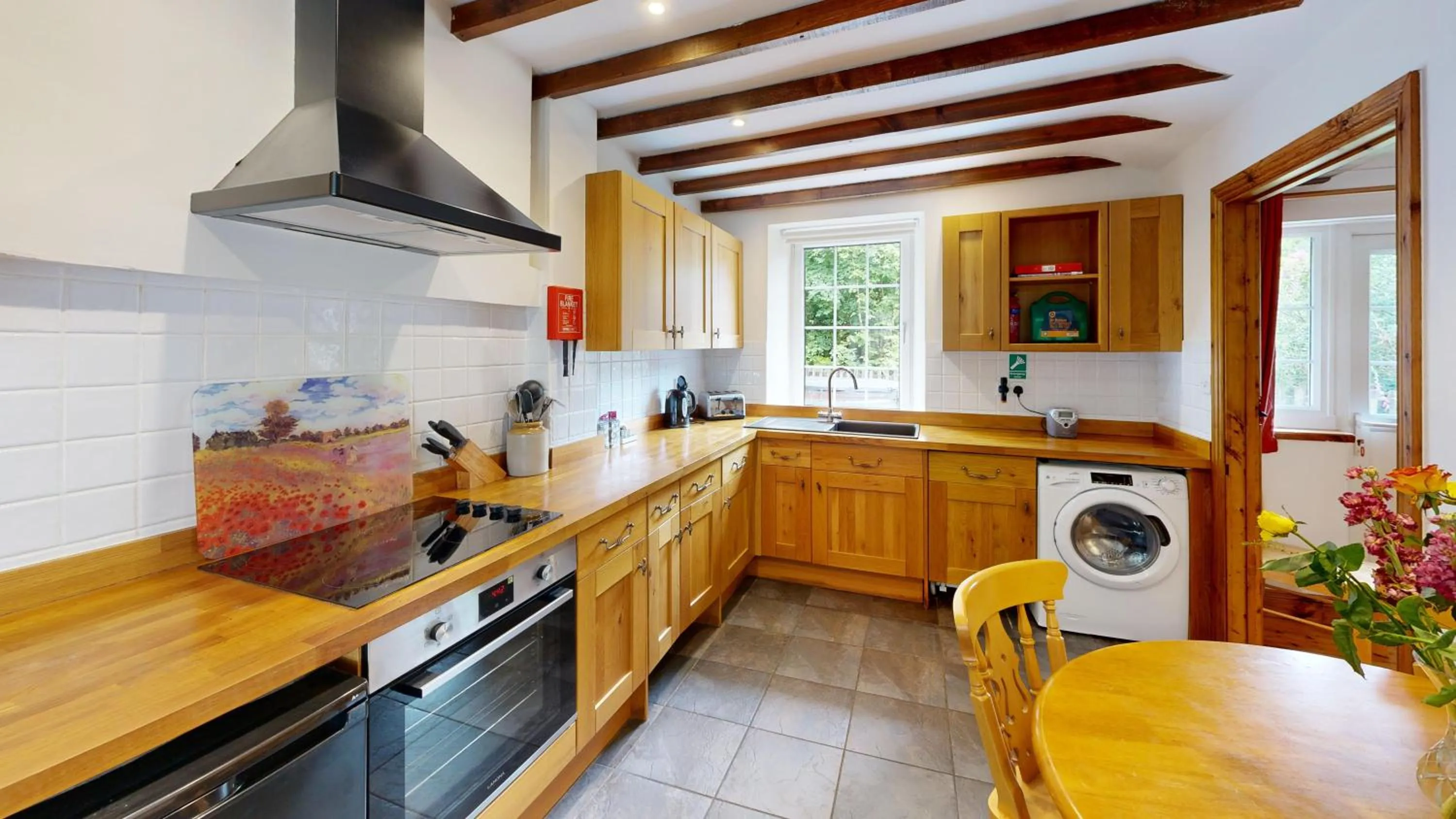Kitchen or kitchenette in Swansea Valley Holiday Cottages
