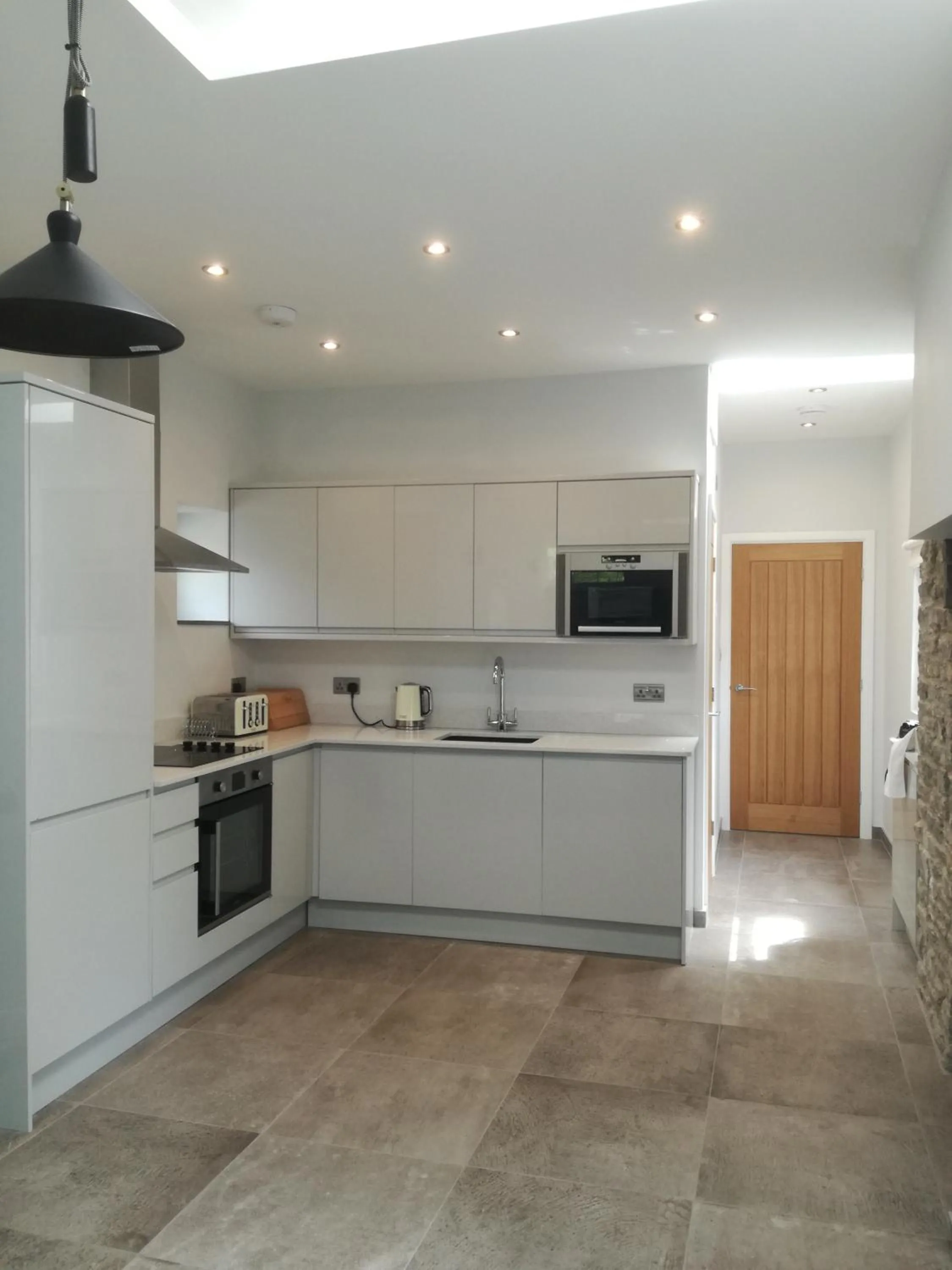Kitchen or kitchenette in Swansea Valley Holiday Cottages