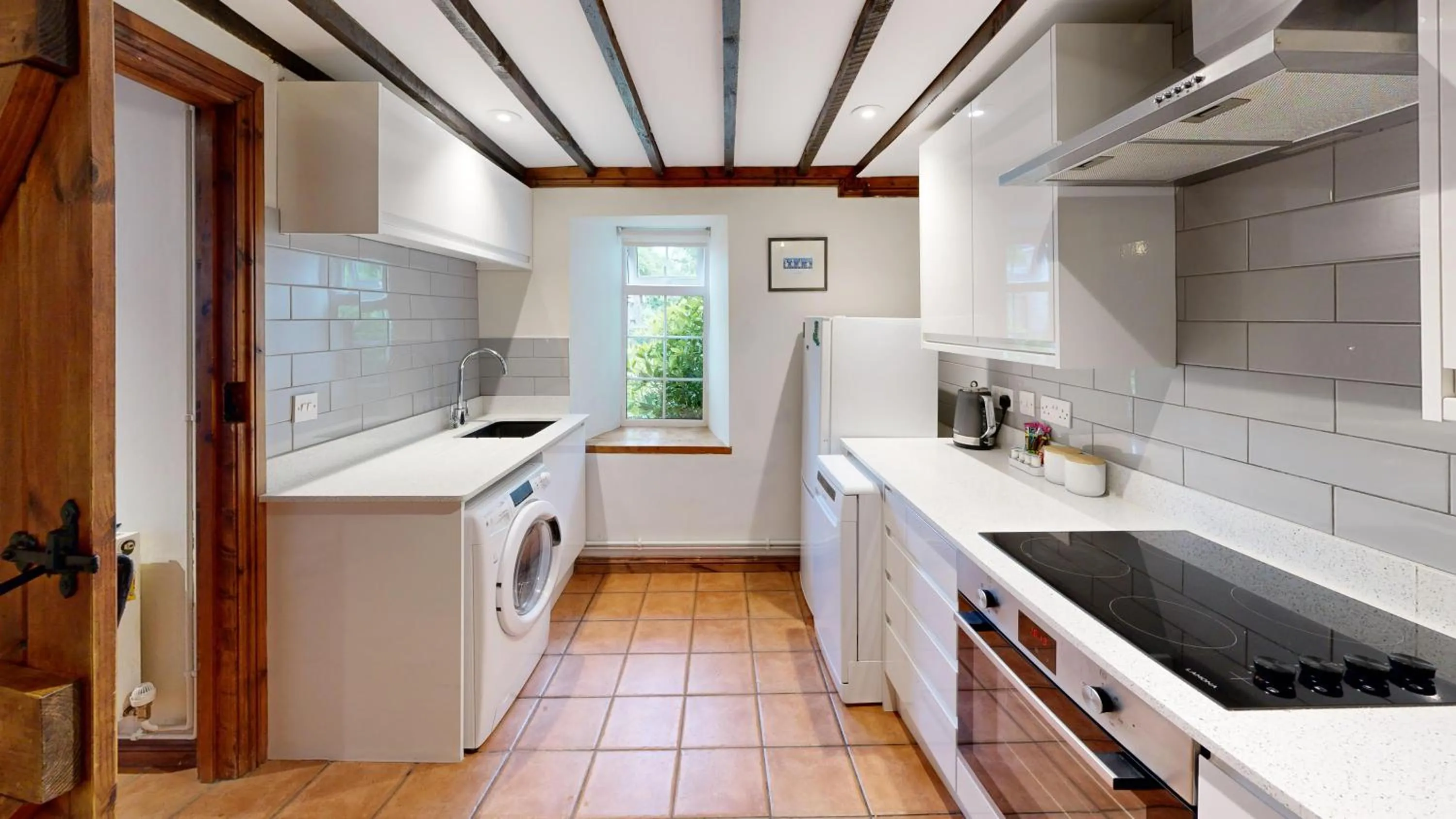 Kitchen or kitchenette in Swansea Valley Holiday Cottages