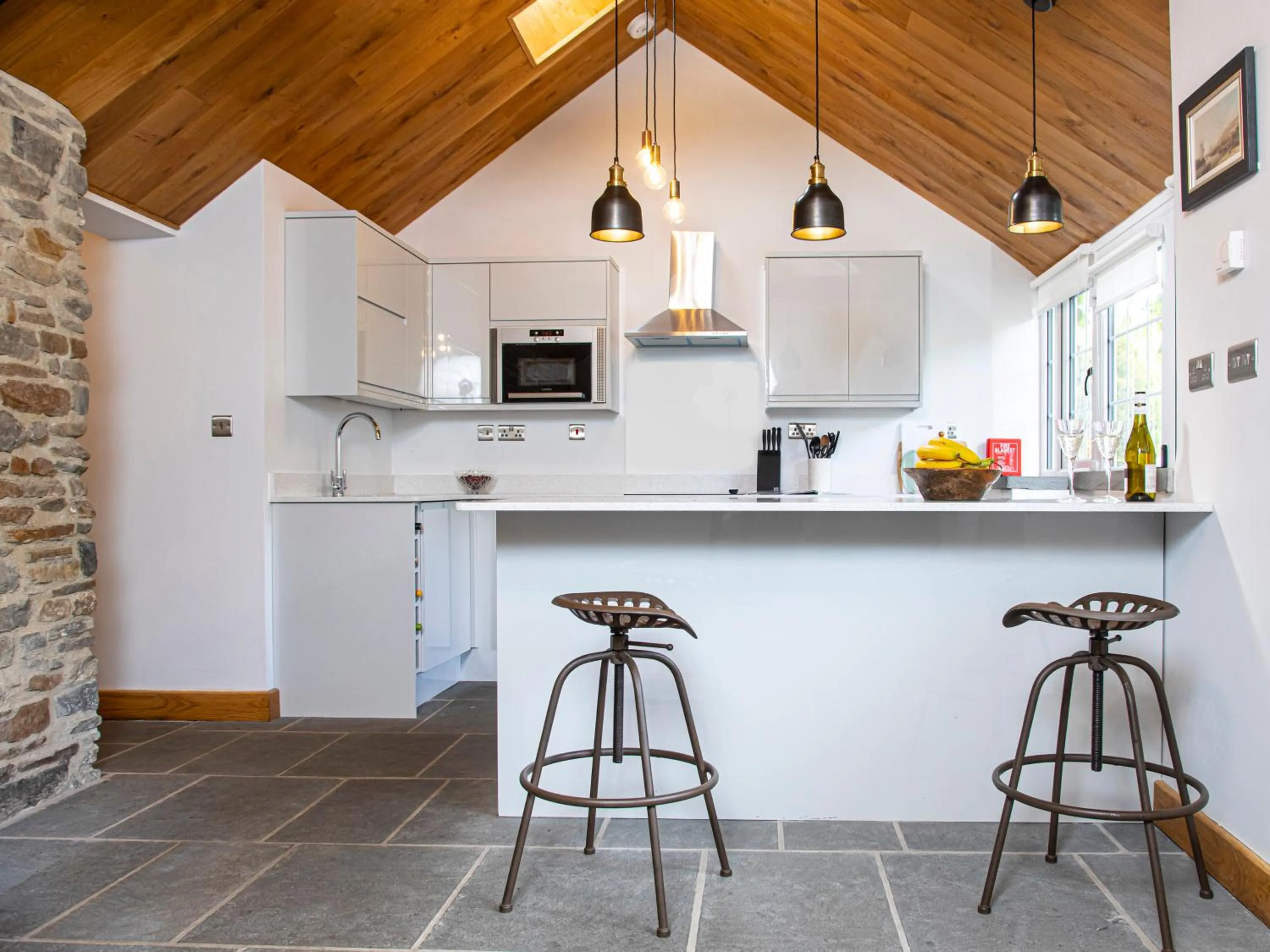 Kitchen or kitchenette in Swansea Valley Holiday Cottages