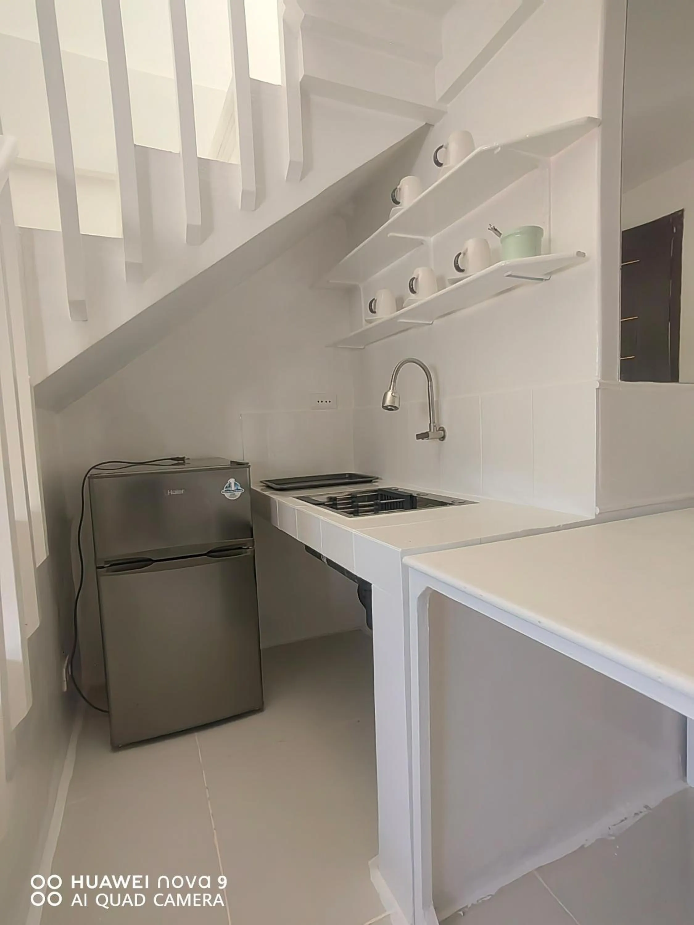 Kitchen or kitchenette in Mecasa Hotel