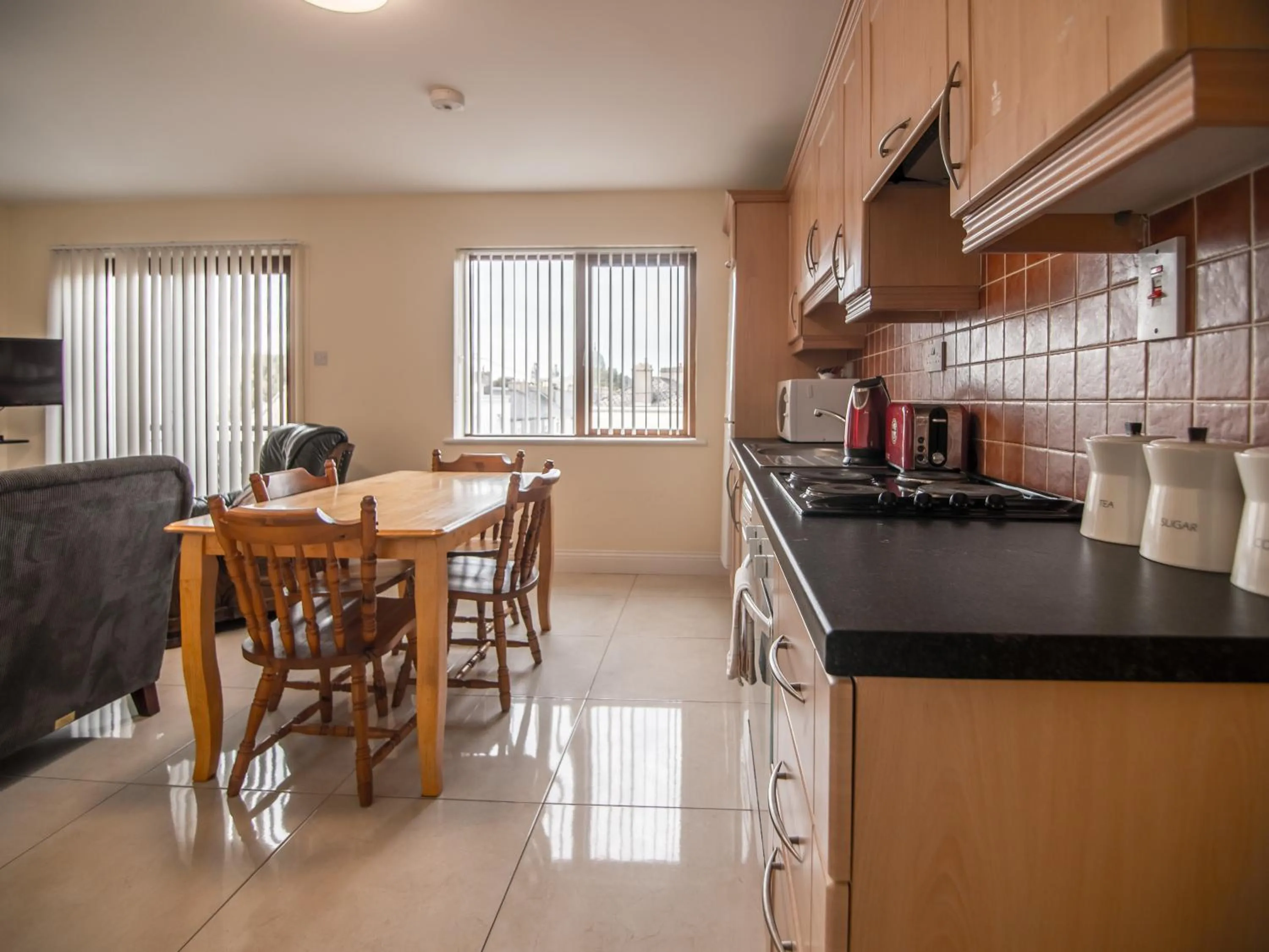Dining area in Donegan Court Aparthotel