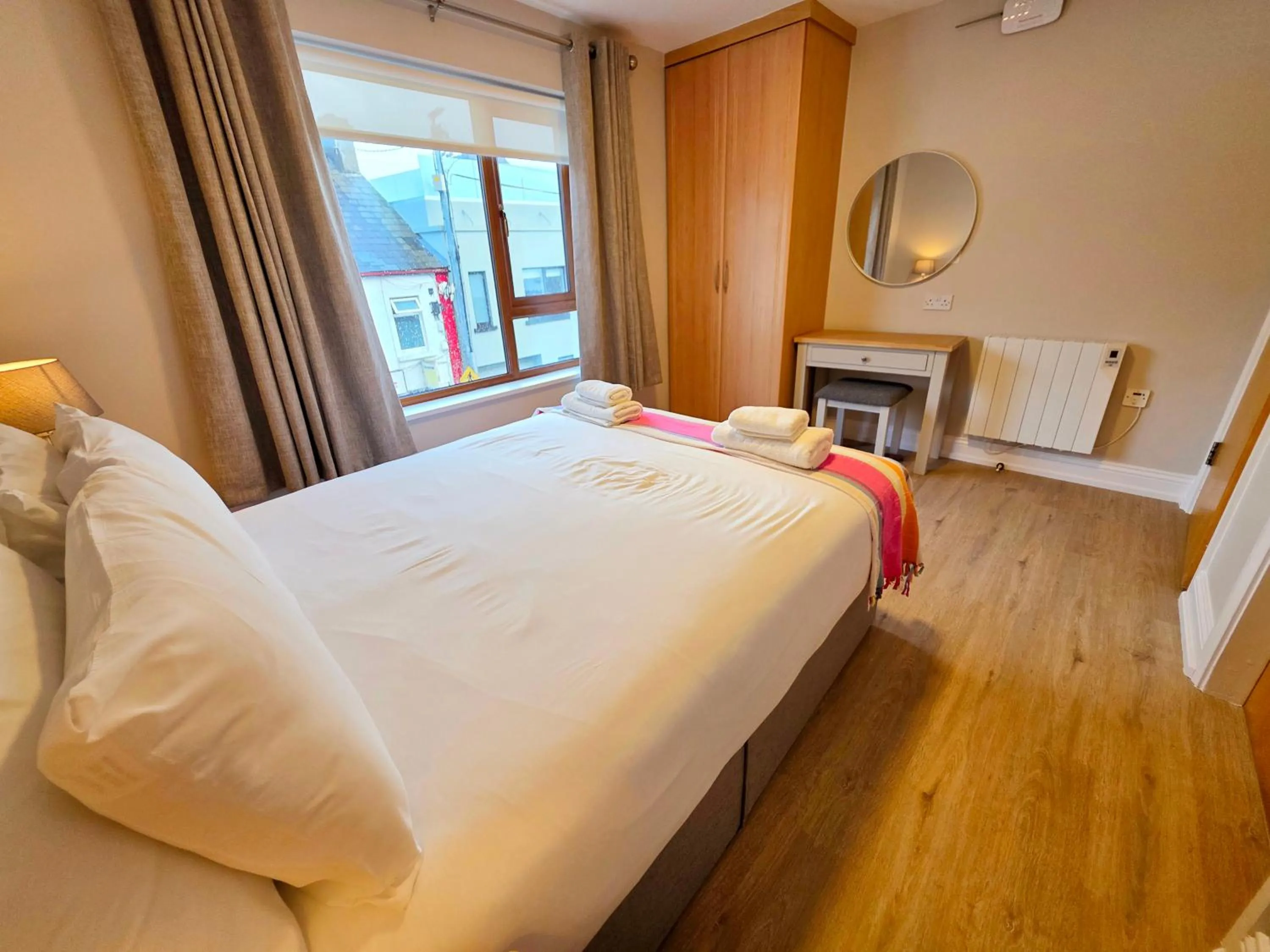 Bed in Donegan Court Aparthotel