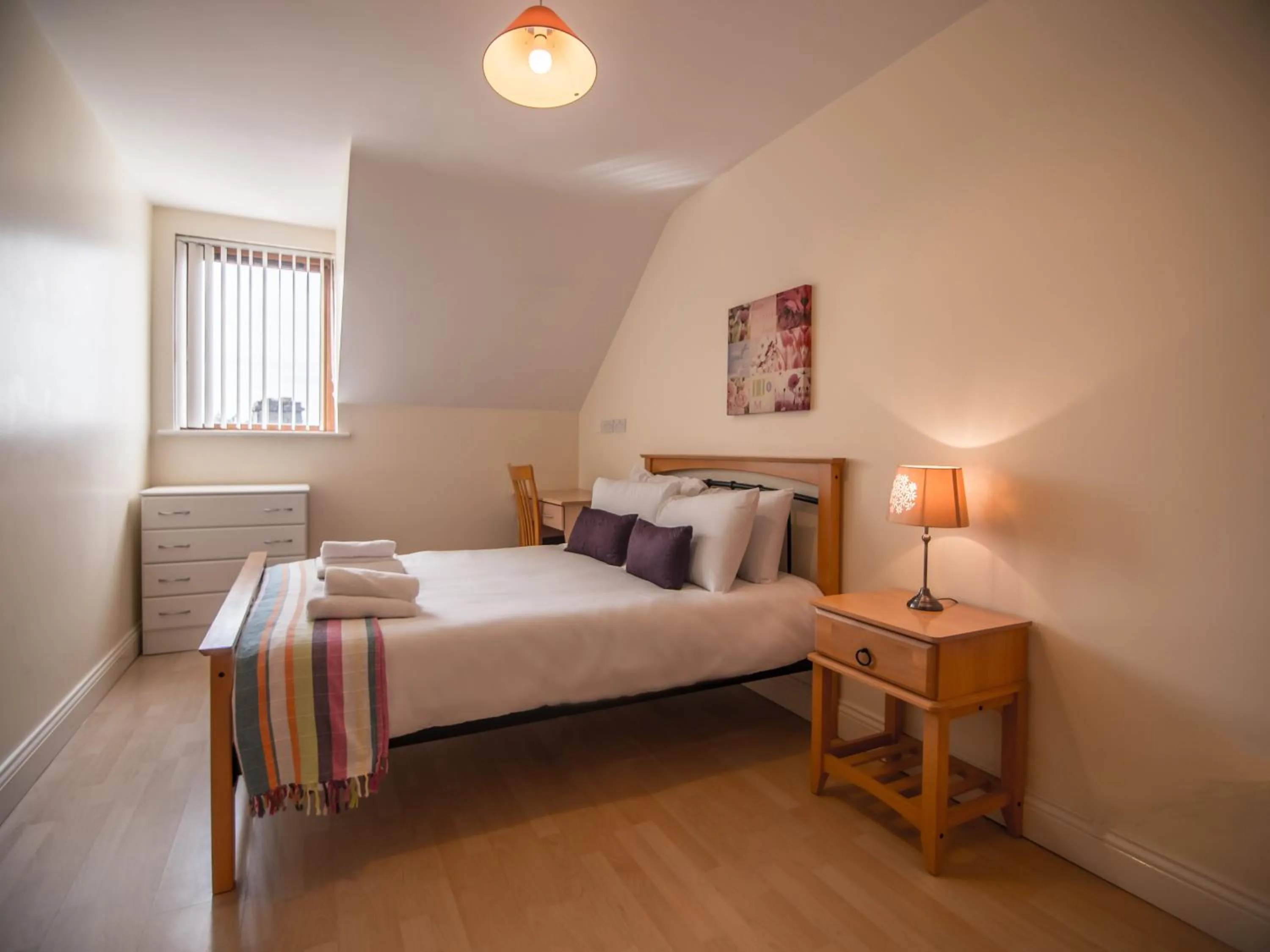 Bed in Donegan Court Aparthotel