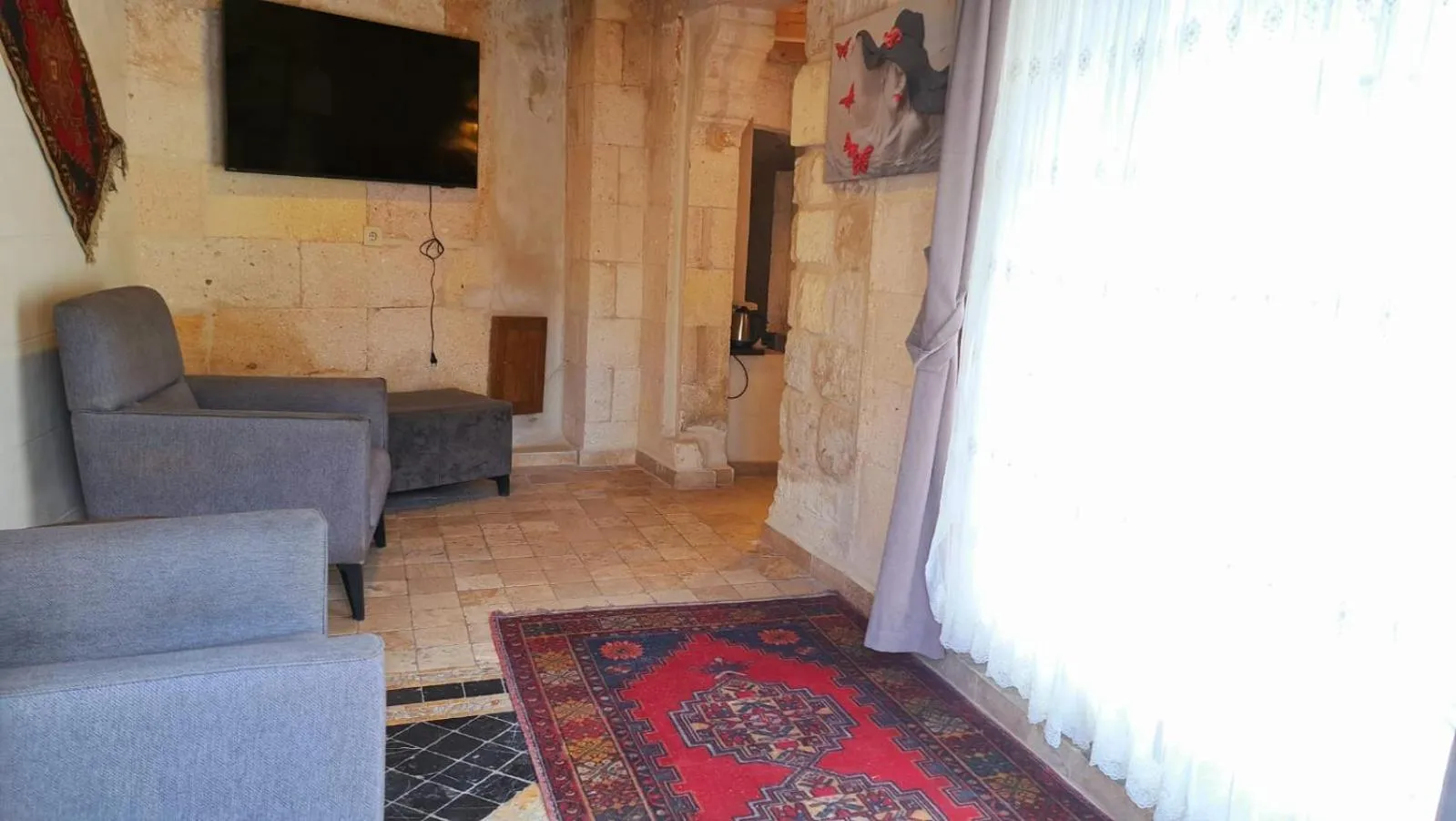 Living room in Shoestring Cave House