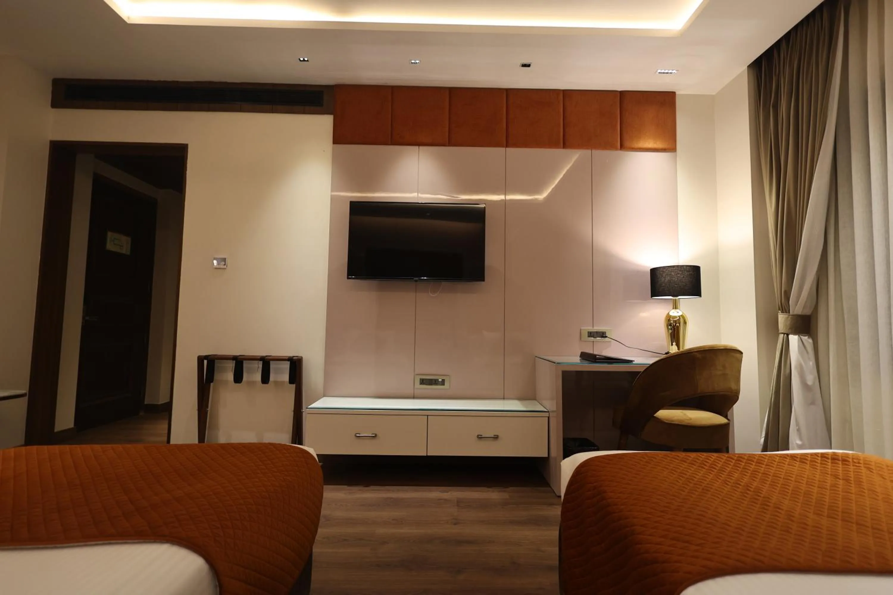 Communal lounge/ TV room in The Ramayana Hotel, Ayodhya