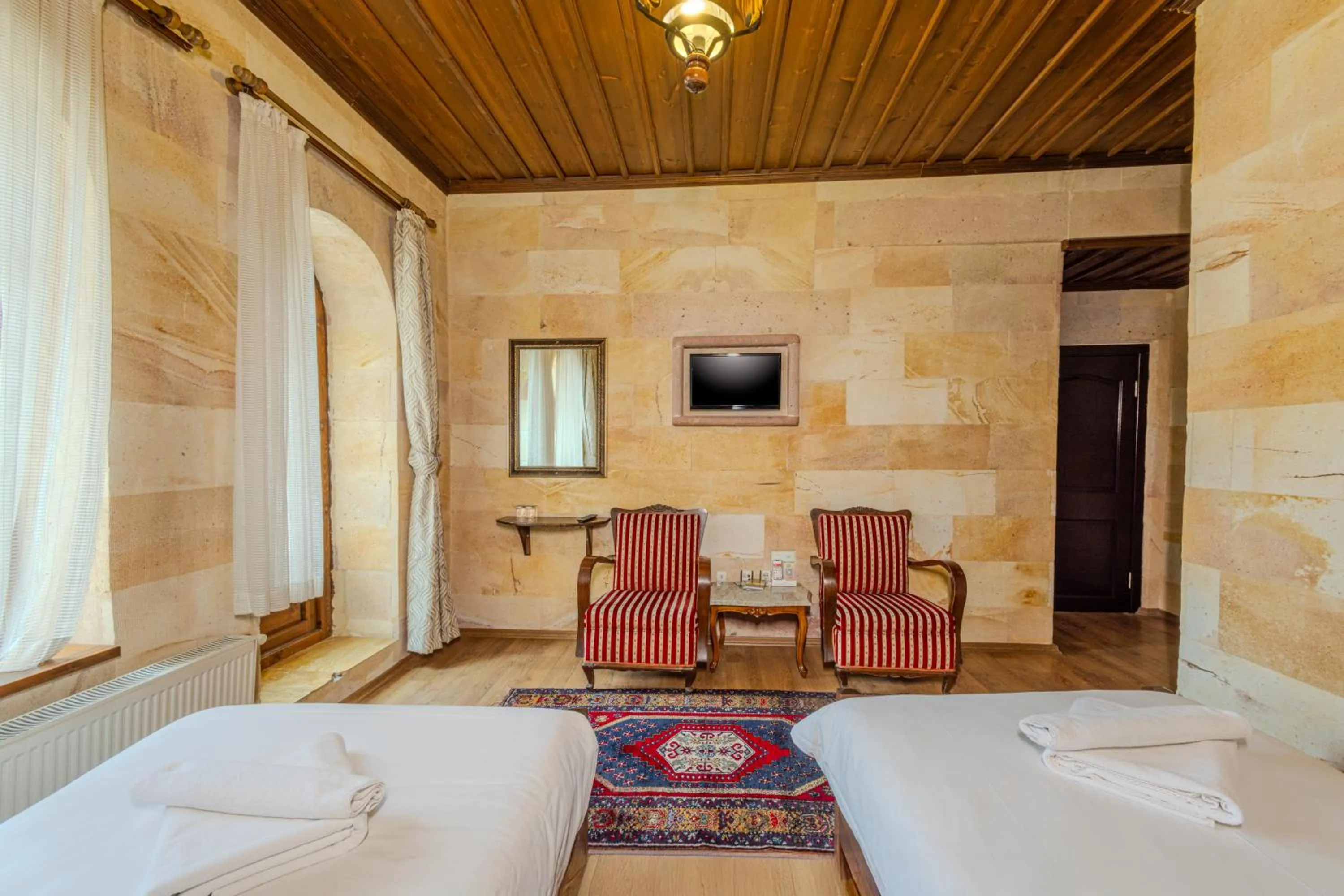 Bed in Akuzun Stone Hotel