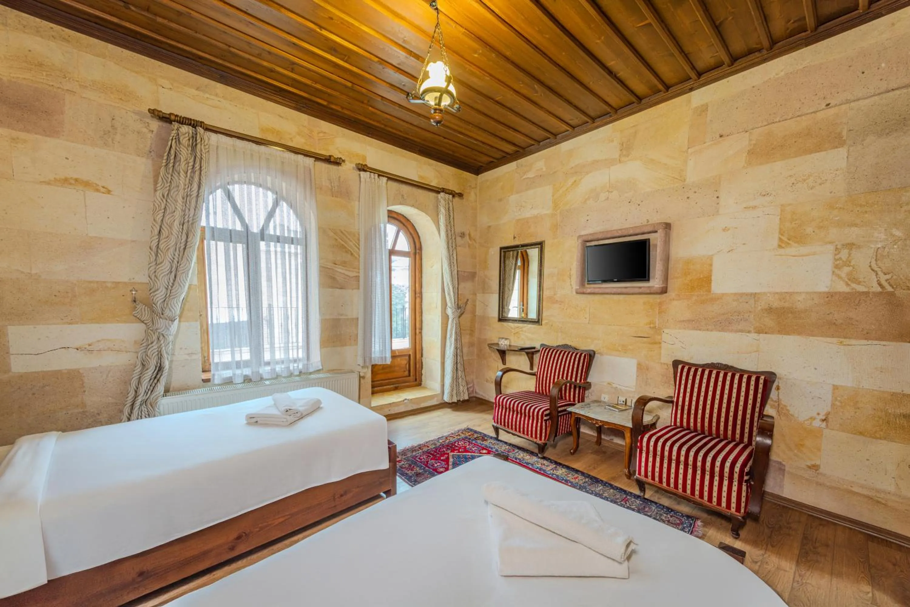 Bed in Akuzun Stone Hotel