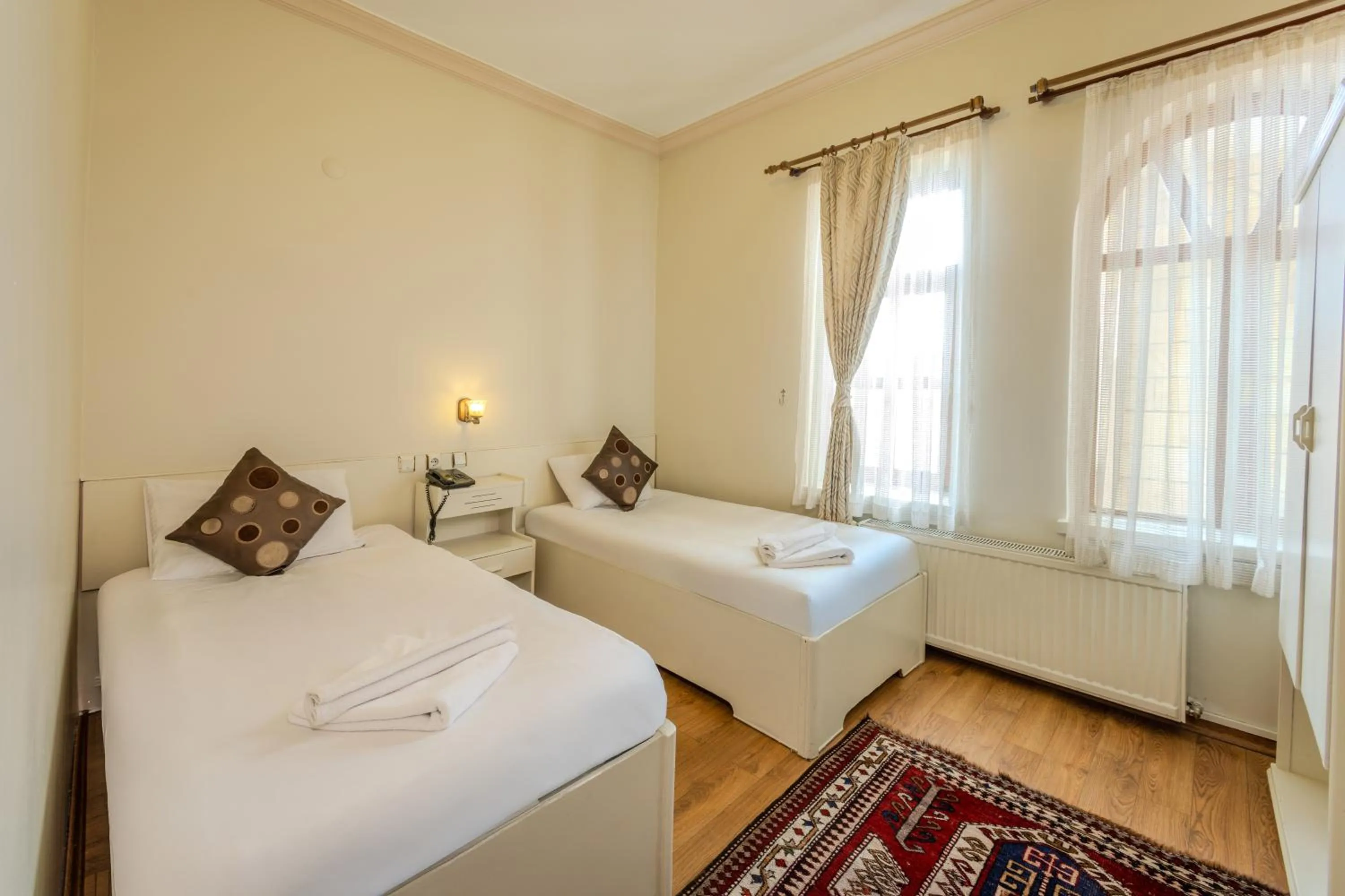 Bed in Akuzun Stone Hotel