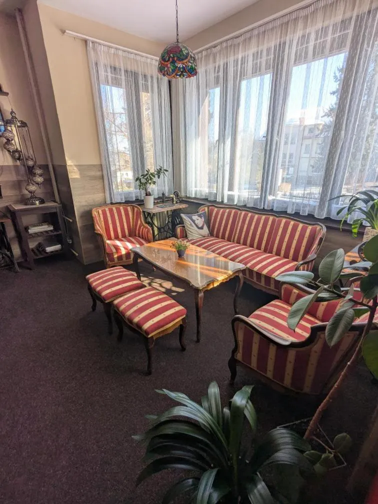 Communal lounge/ TV room in Hotel Alfa