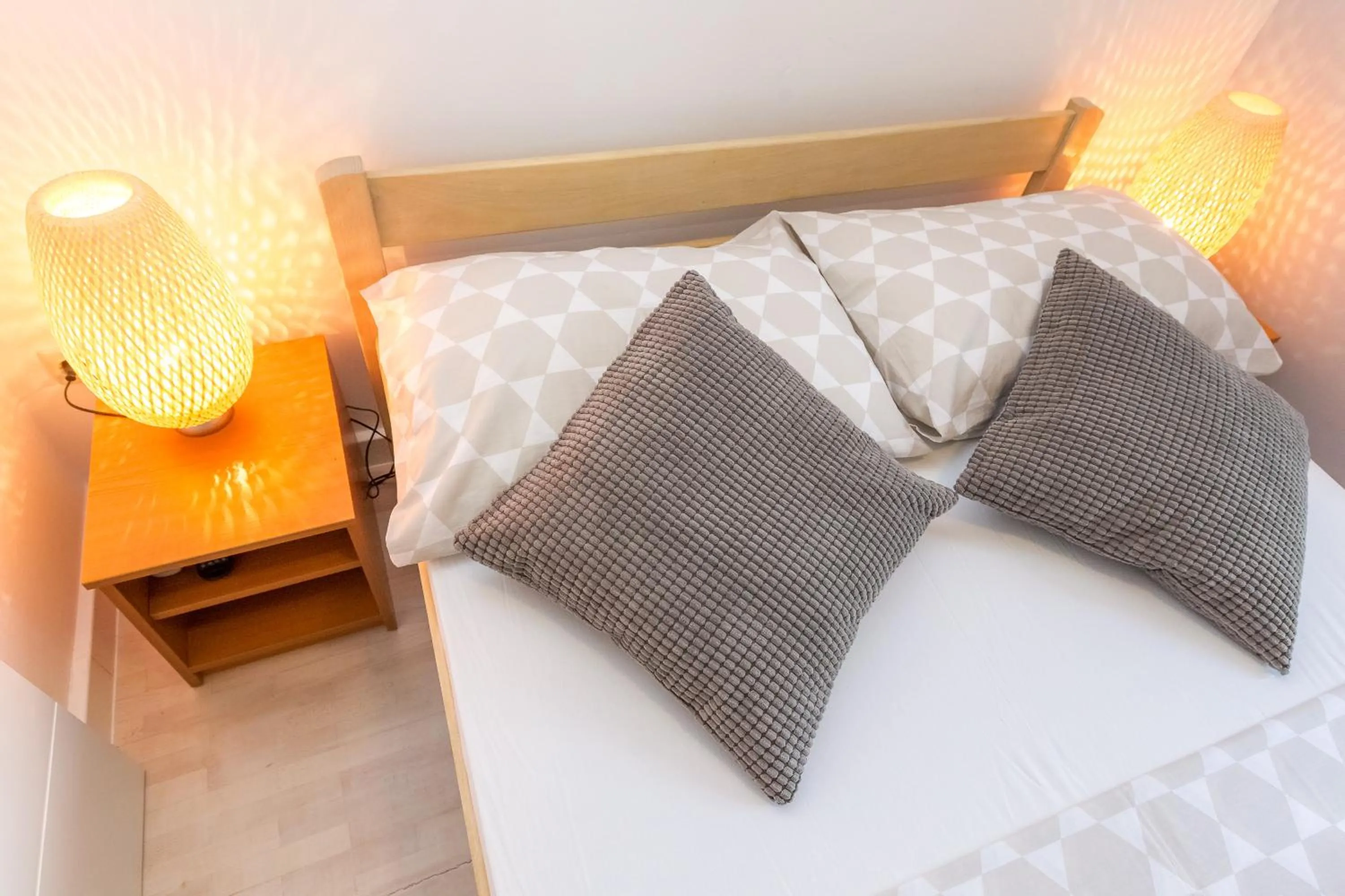 Bed in Apartments in city center Ventus