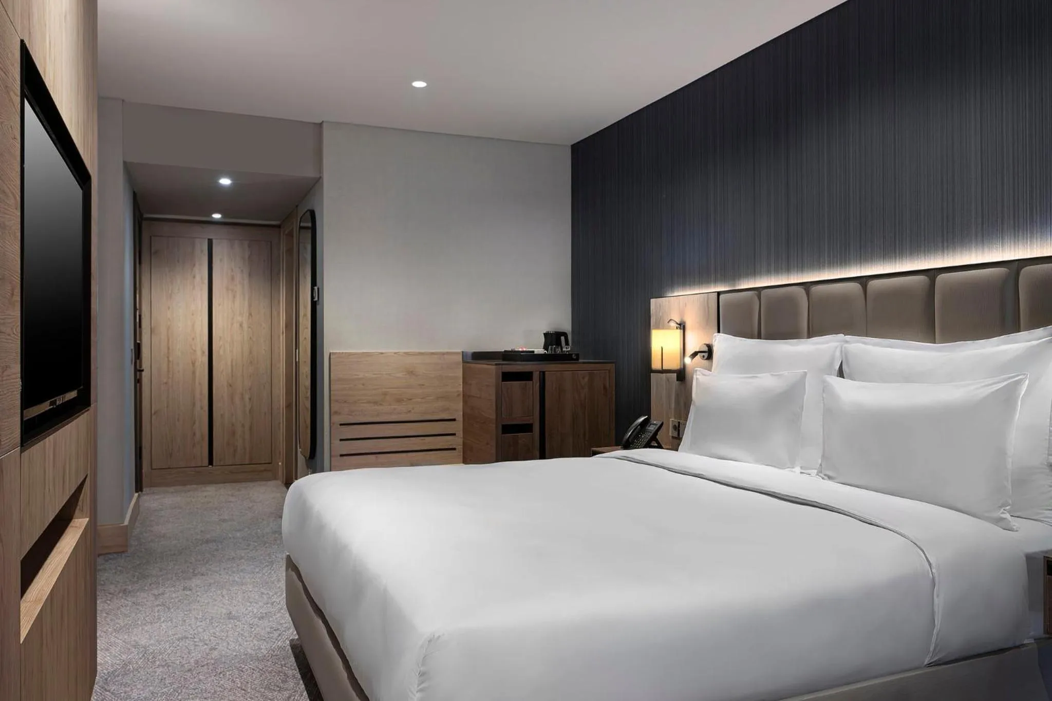 Photo of the whole room, Bed in Crowne Plaza Istanbul - Ortakoy Bosphorus by IHG
