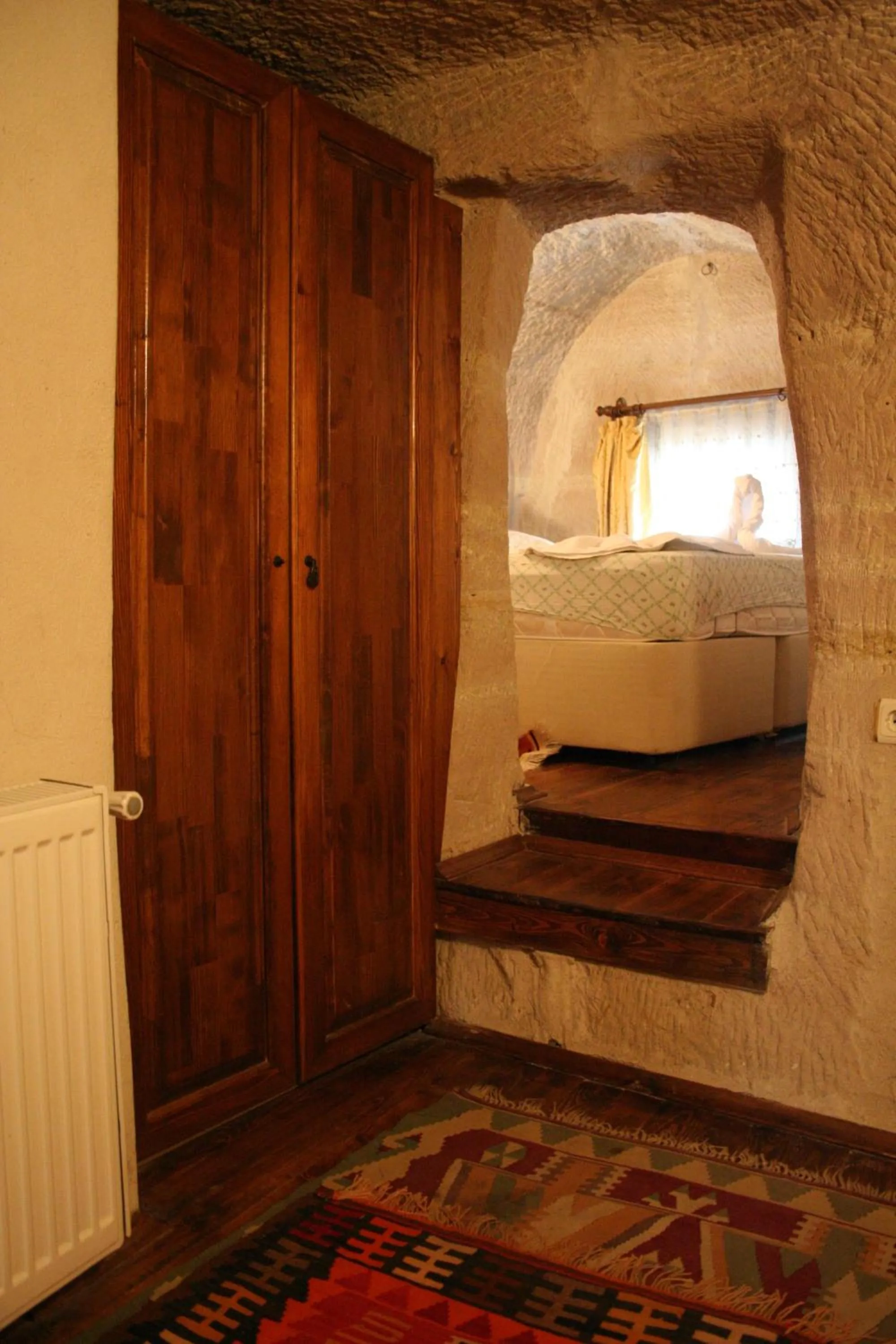 Shower, Bed in Anatolia cave hotel Pension
