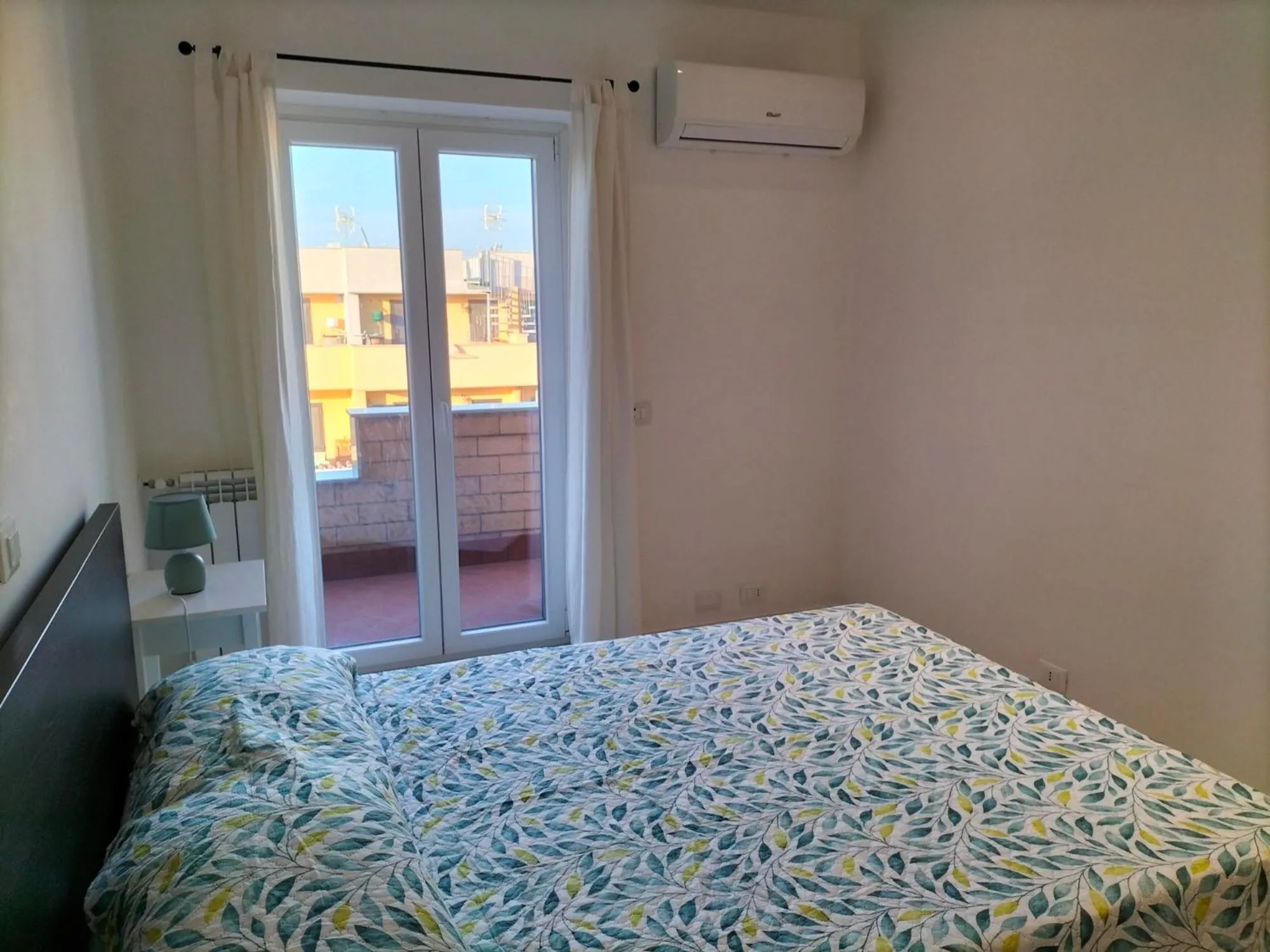 Bed in THE HOUSE FIERA di ROMA AEROPORTO FIUMICINO