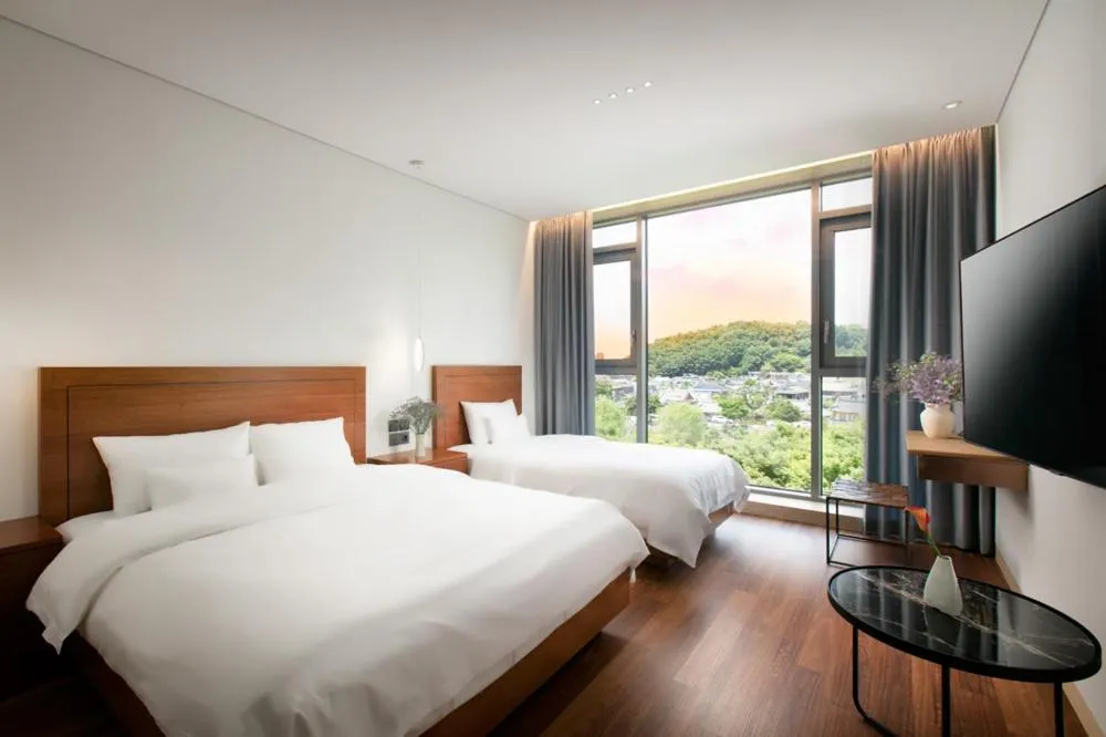 Photo of the whole room, Bed in Daon Hotel