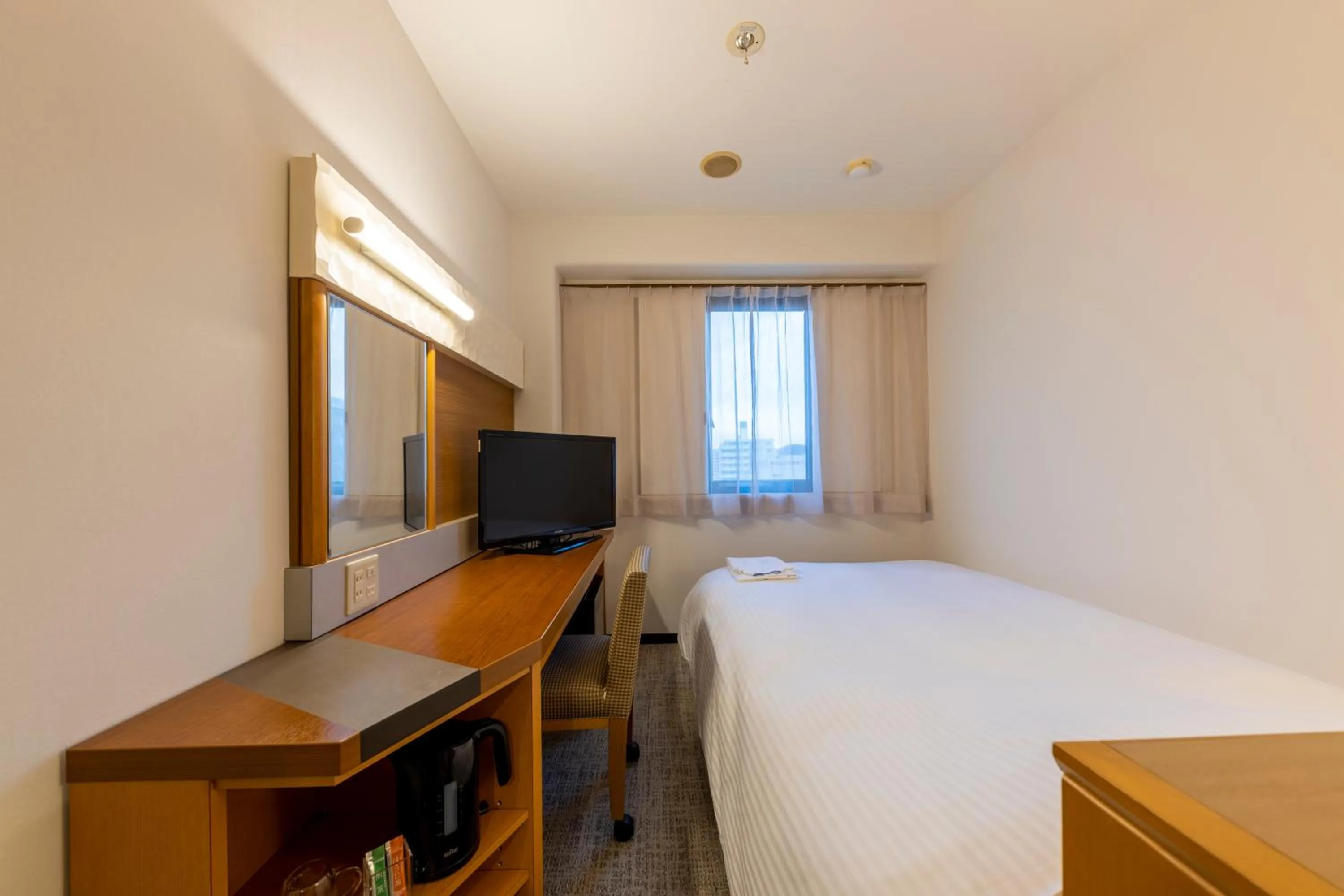 Bed in JR CLEMENT INN HIMEJI