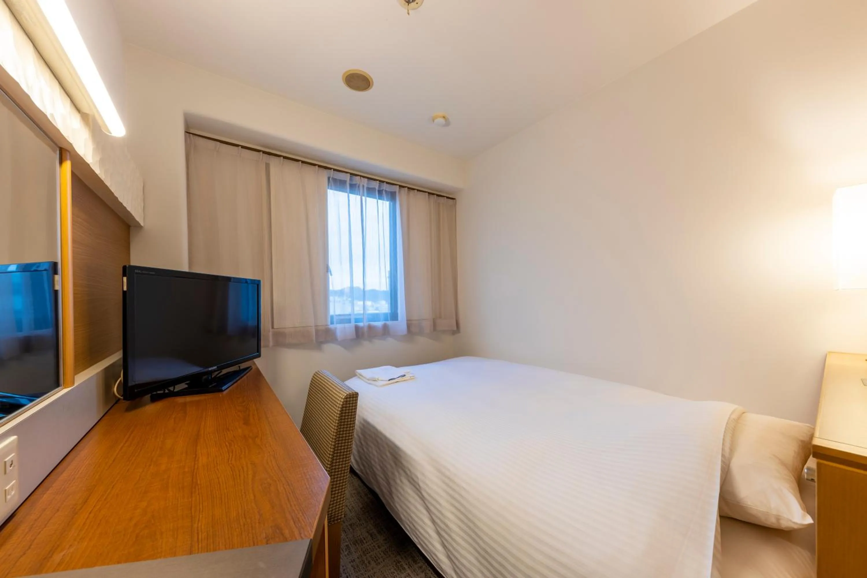 Photo of the whole room, Bed in JR CLEMENT INN HIMEJI