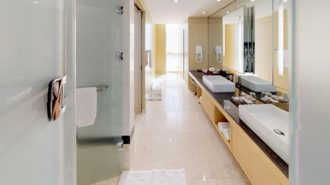 Bed in High1 Grand Hotel Convention Tower