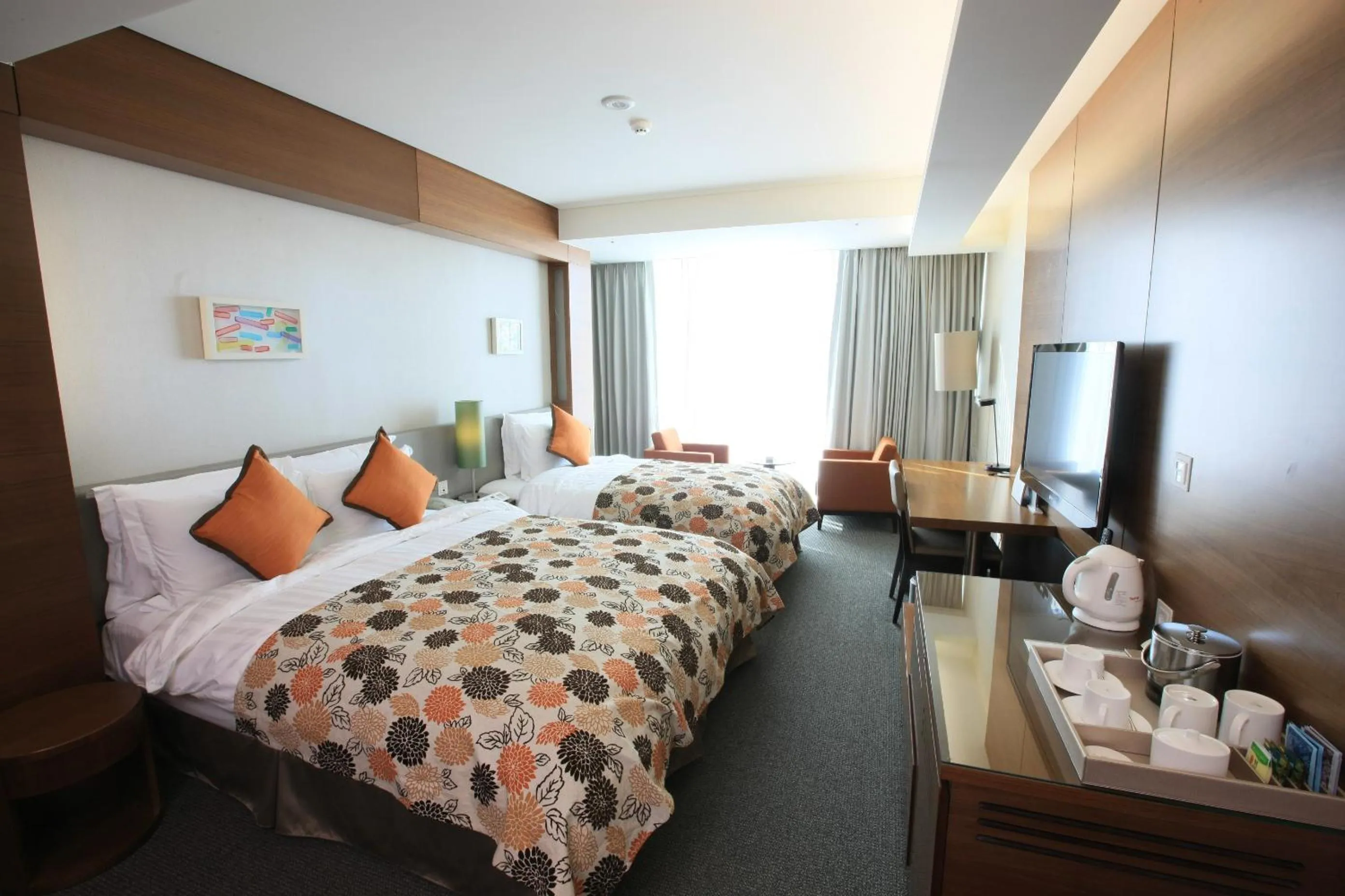 Bed in High1 Grand Hotel Convention Tower