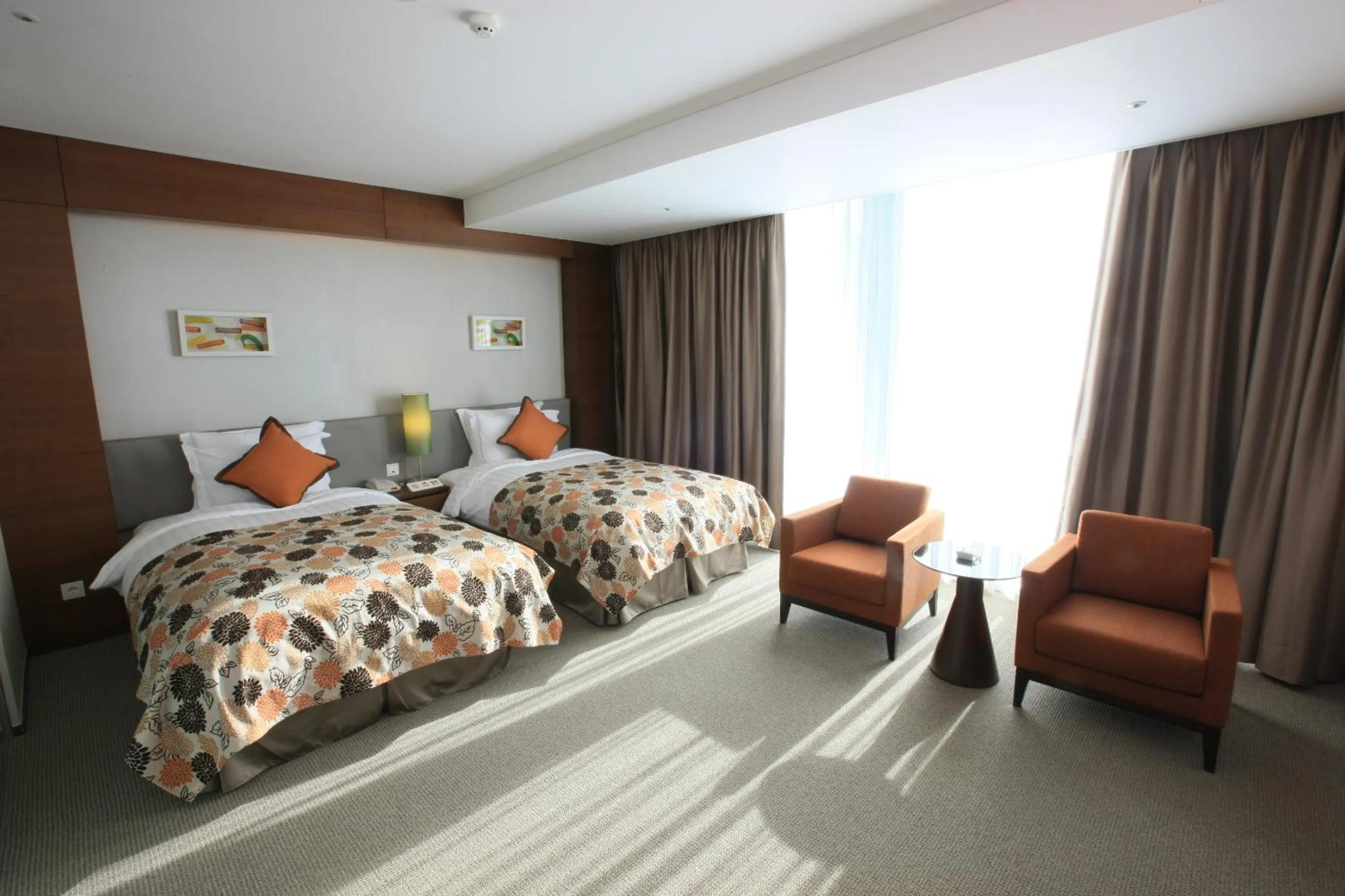 Bed in High1 Grand Hotel Convention Tower