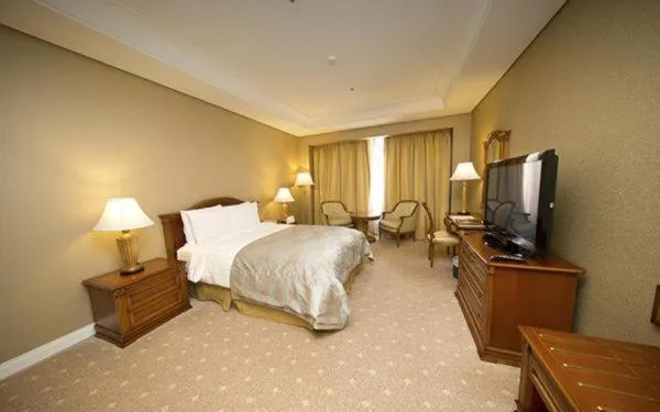 Bed in High1 Grand Hotel Main Tower