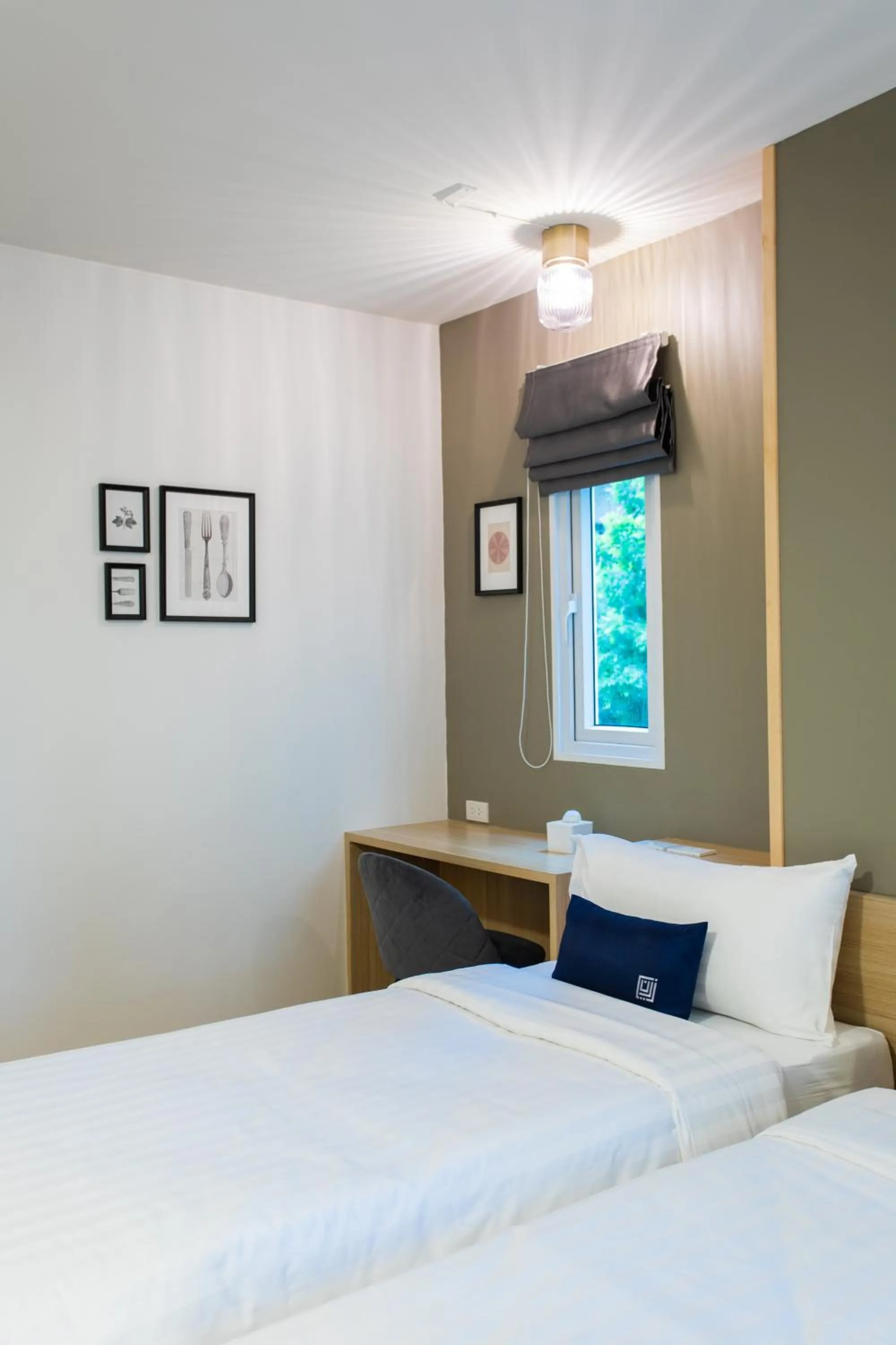 Bed in Zayn Express & Suites