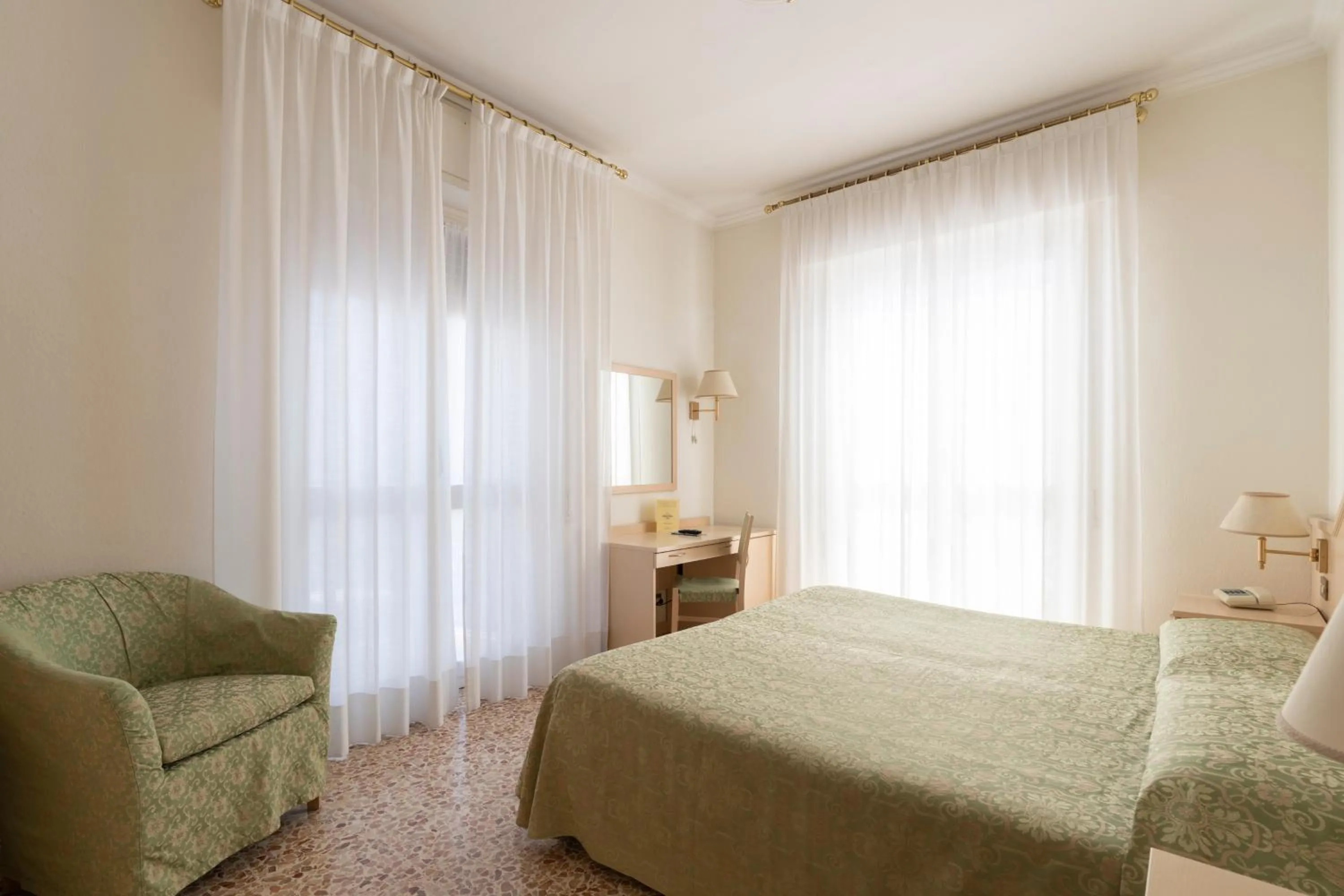 Bedroom in Hotel Aida