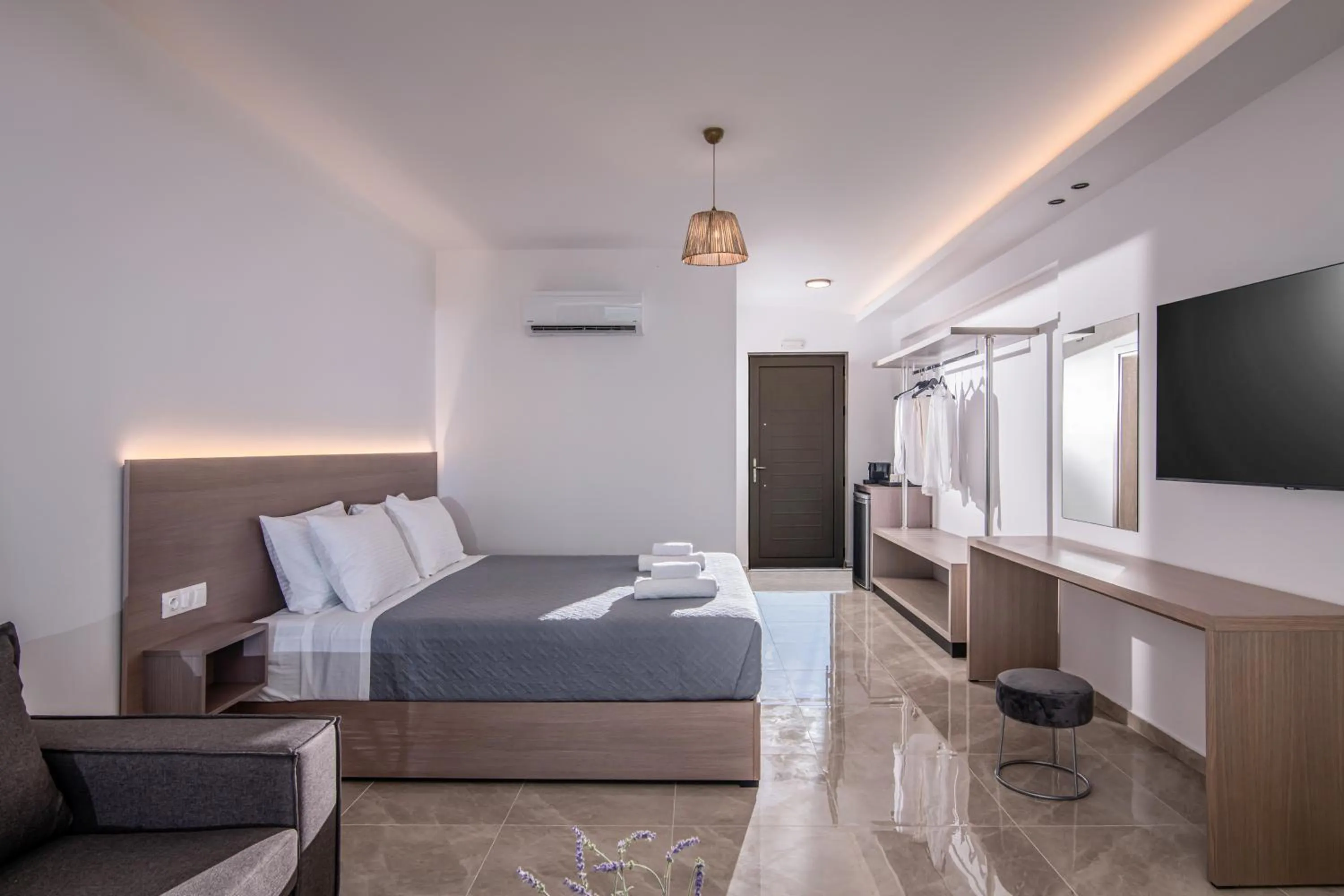 Bedroom, Bed in Ebenus Suites "Adults Only" by Checkin