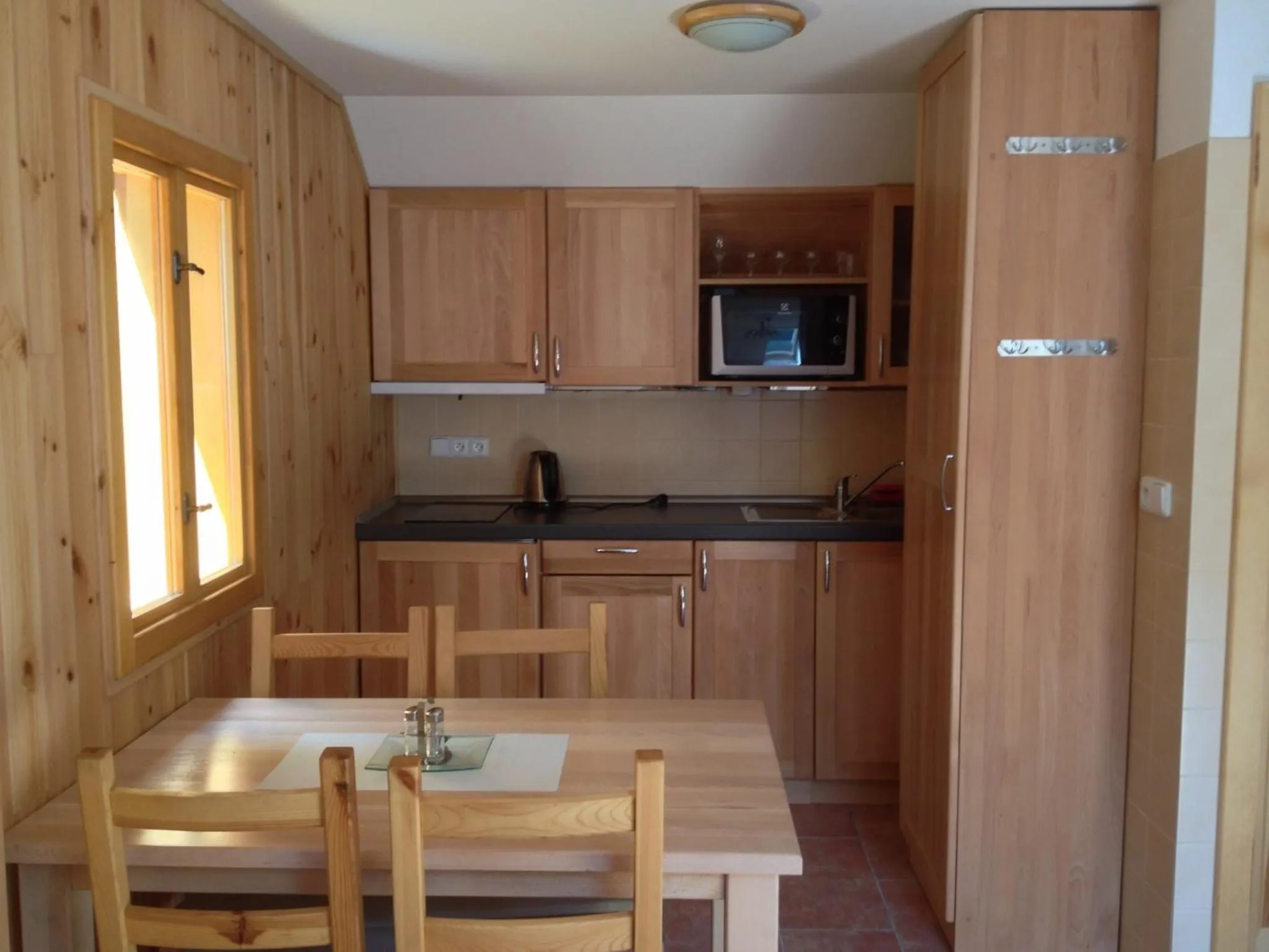 Kitchen or kitchenette in Chata Hokejka