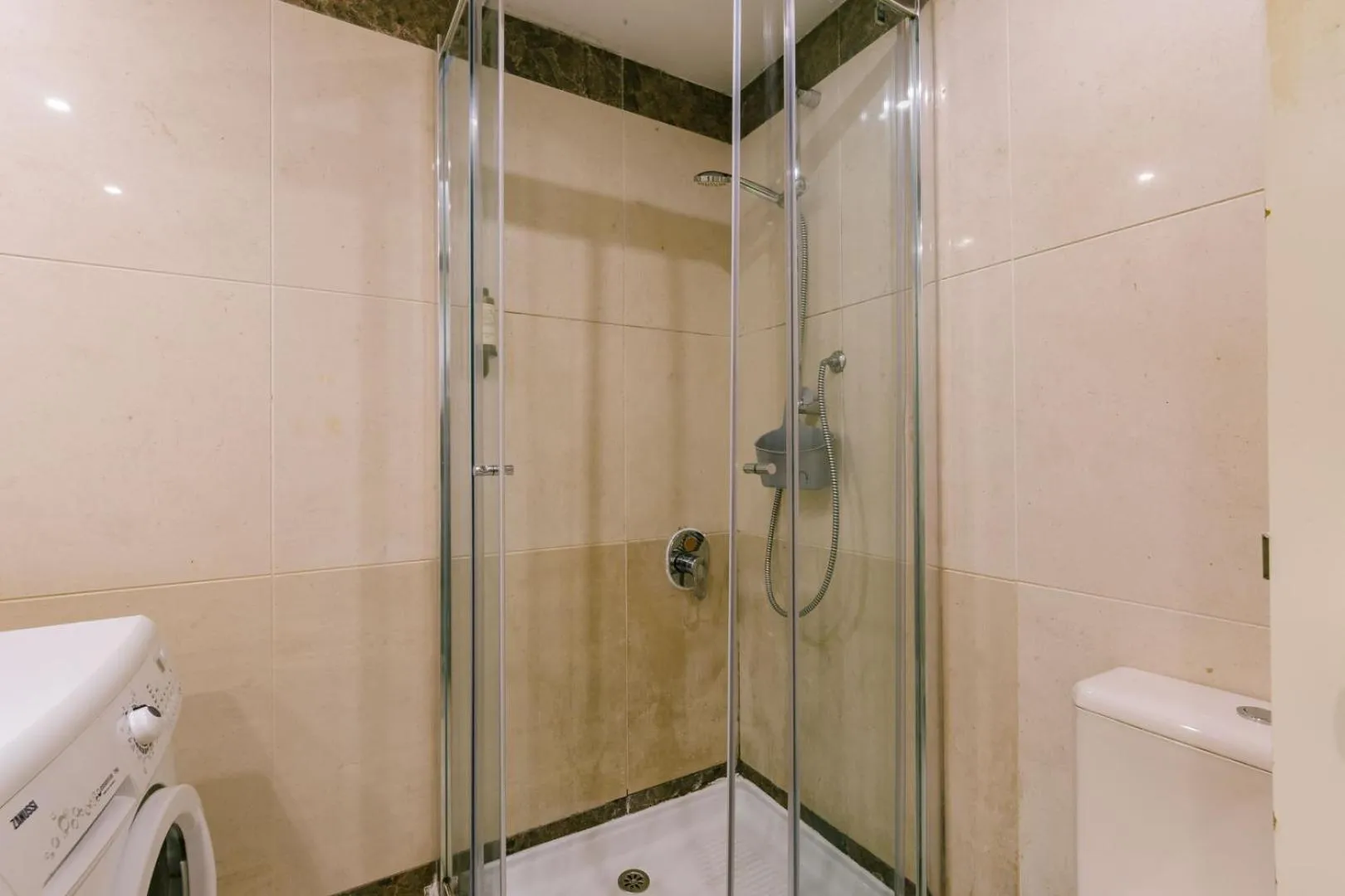 Shower in Rent4Rest Estoril Beachfront Apartments