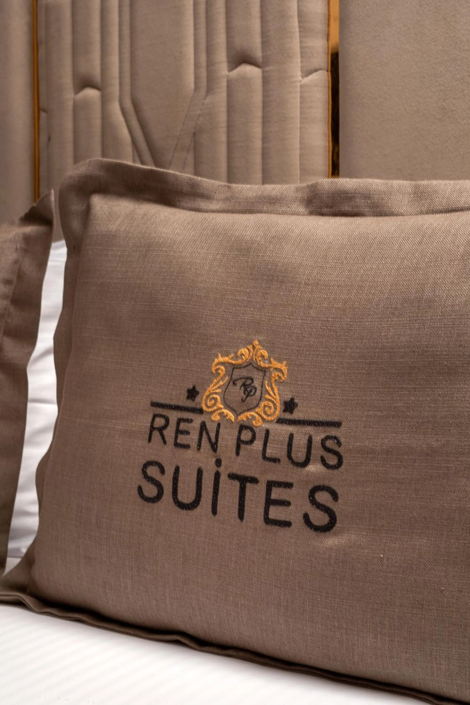 Property logo or sign, Bed in REN PLUS SUITES