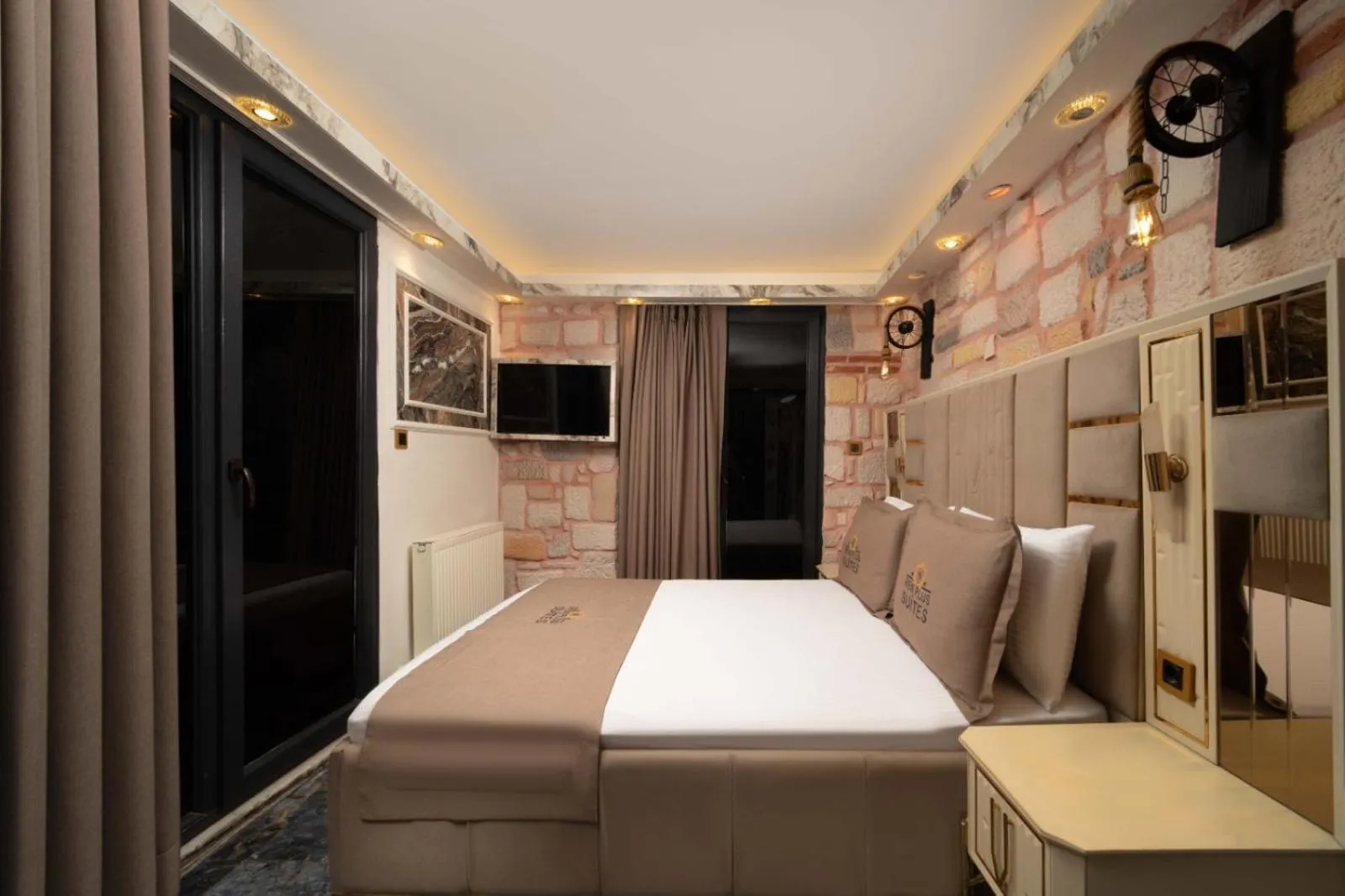 Bed in REN PLUS SUITES