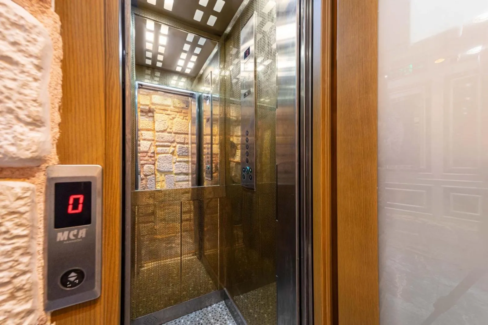 elevator in REN PLUS SUITES