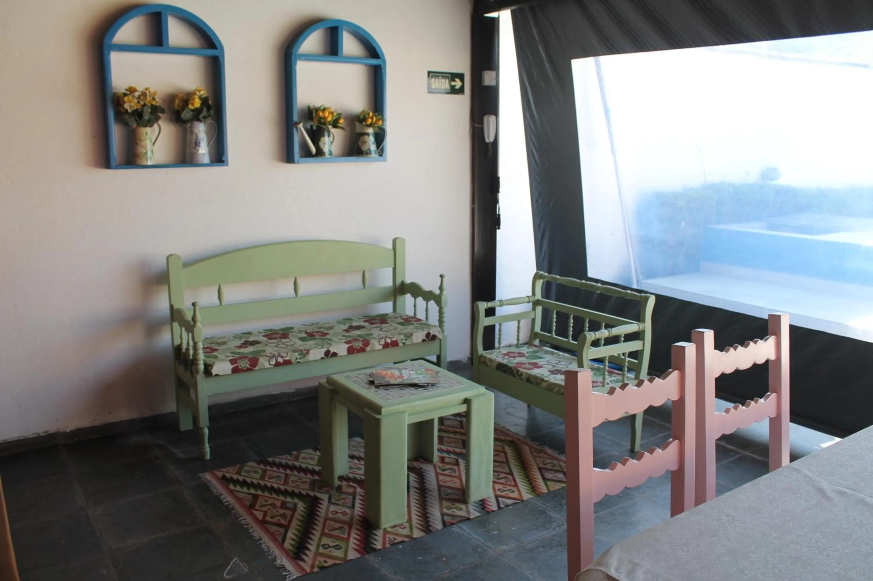 Communal lounge/ TV room in Pousada Porto Paraiso, o seu Paraíso Escondido no Guarujá