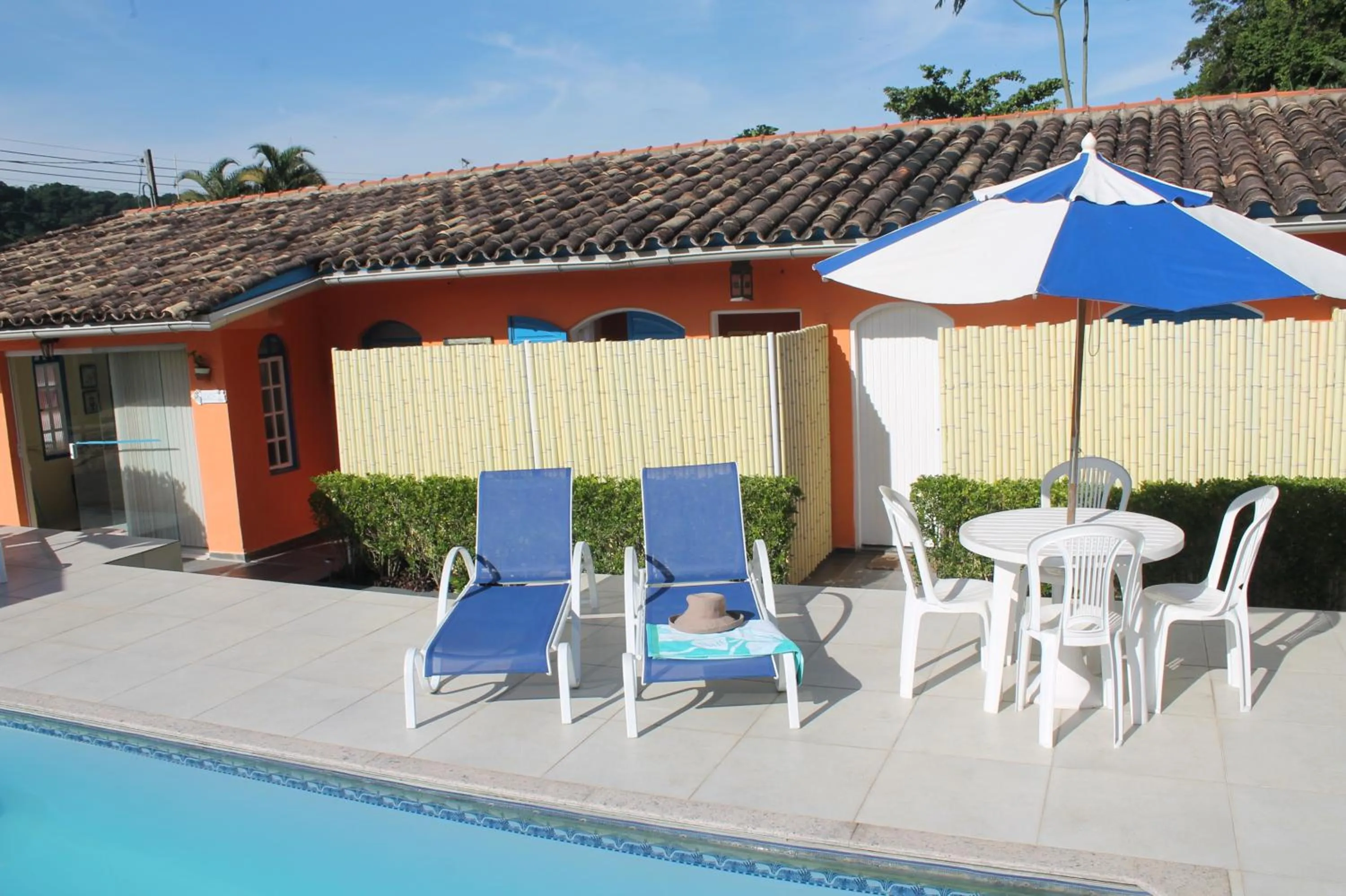 Swimming pool in Pousada Porto Paraiso, o seu Paraíso Escondido no Guarujá