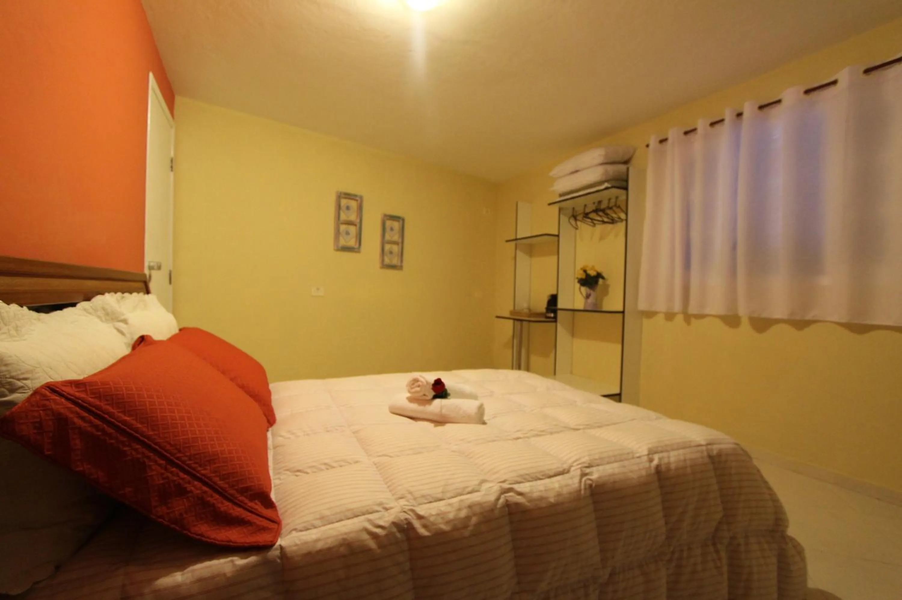 Photo of the whole room, Bed in Pousada Porto Paraiso, o seu Paraíso Escondido no Guarujá