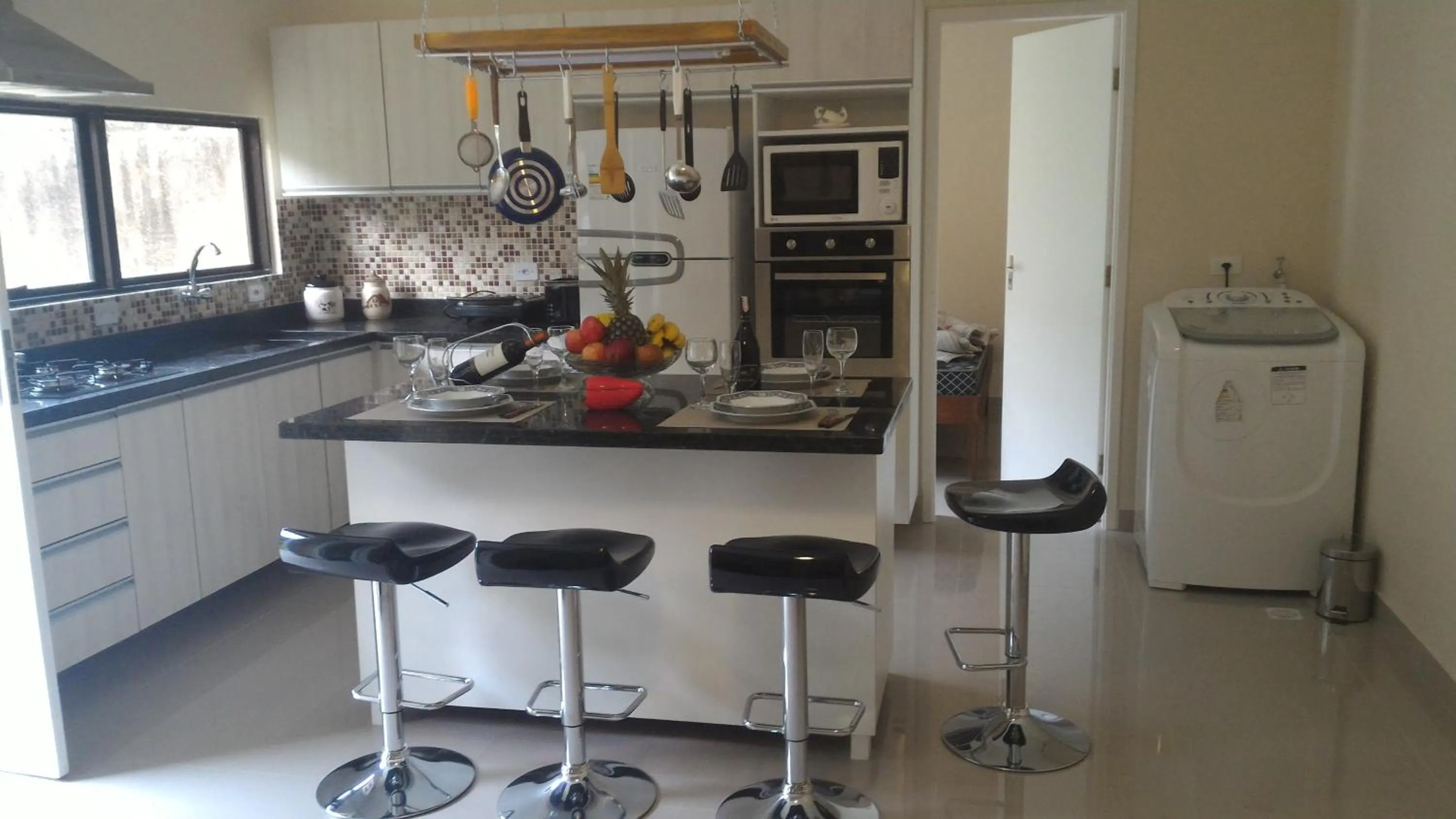 Kitchen or kitchenette in Pousada Porto Paraiso, o seu Paraíso Escondido no Guarujá