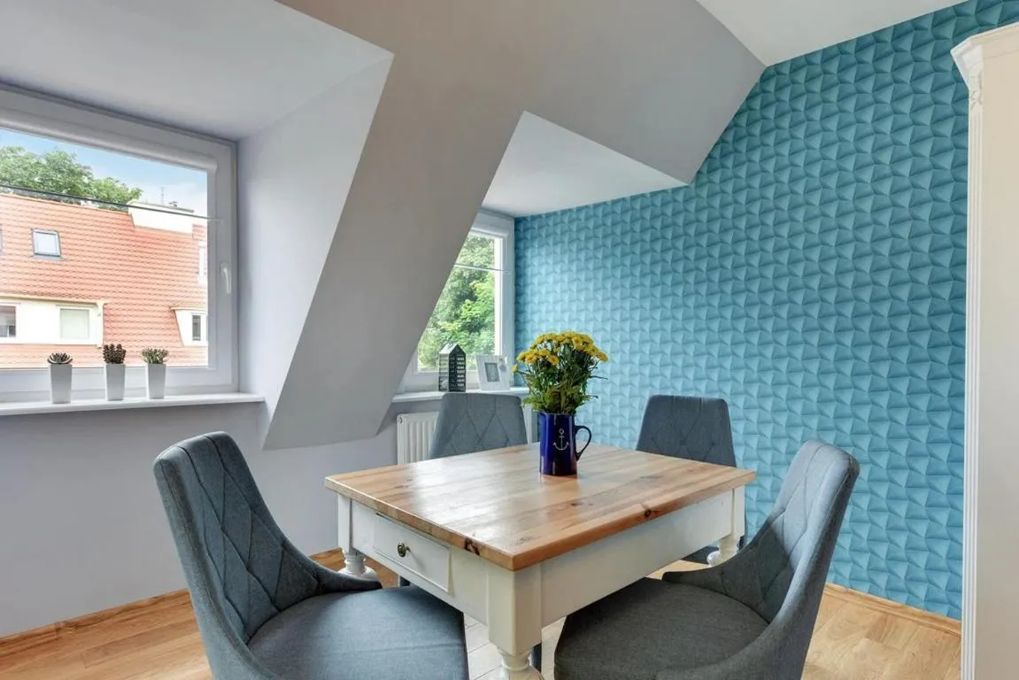 Dining area in Comfort Apartments Sopot