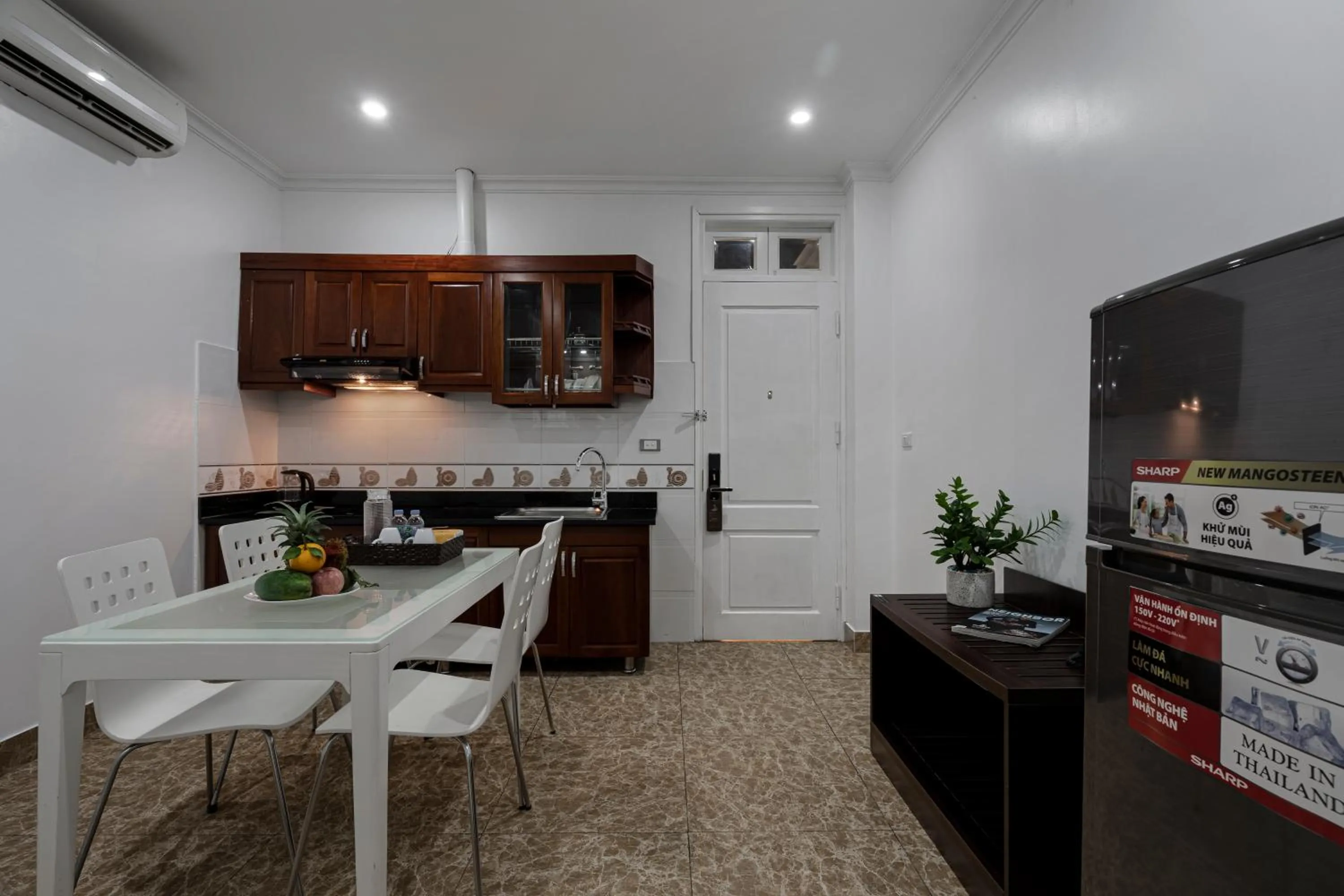 Kitchen or kitchenette in 그레이스 호텔 Grace Hotel & Residence