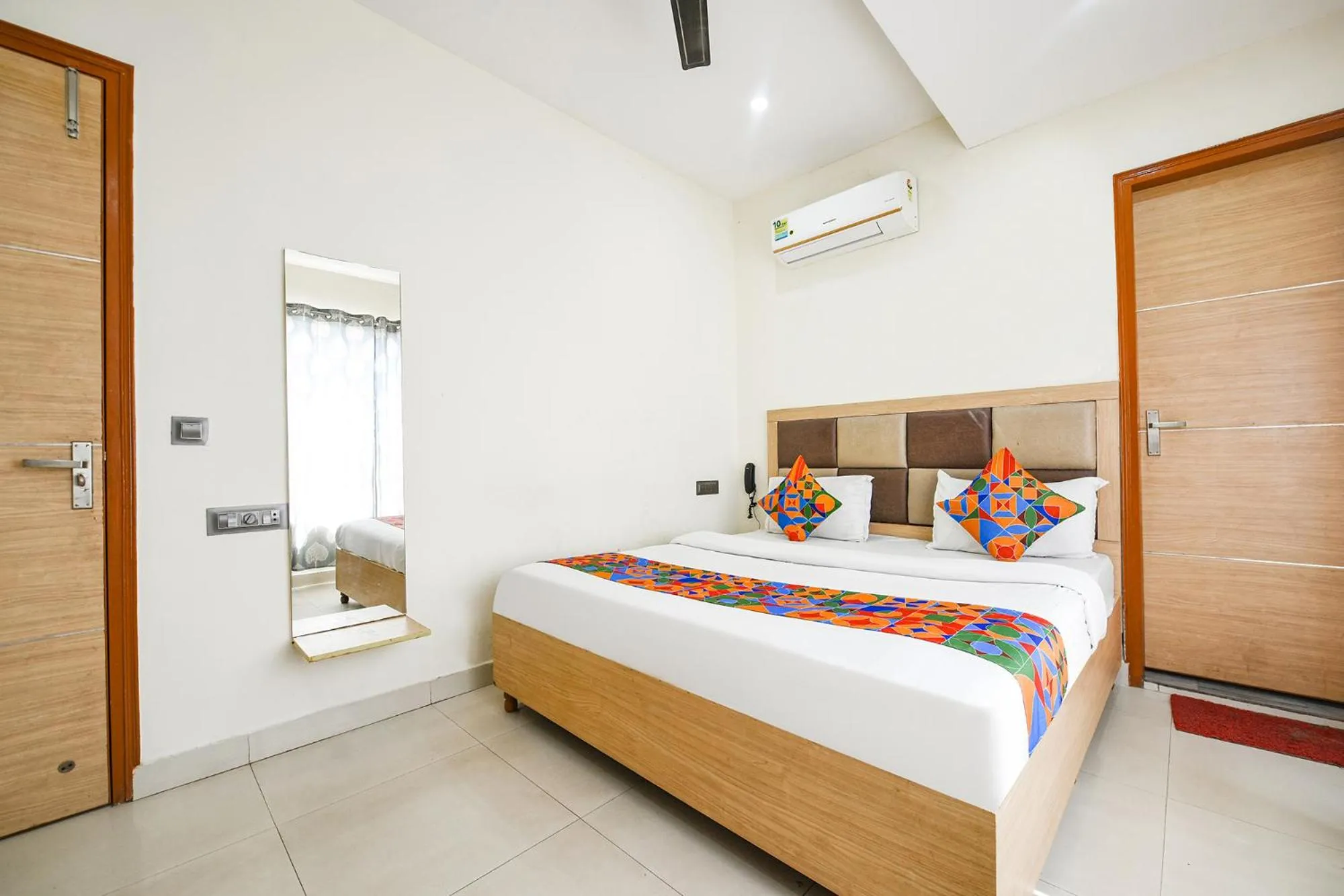 Bed in FabEscape Panchkula Motels