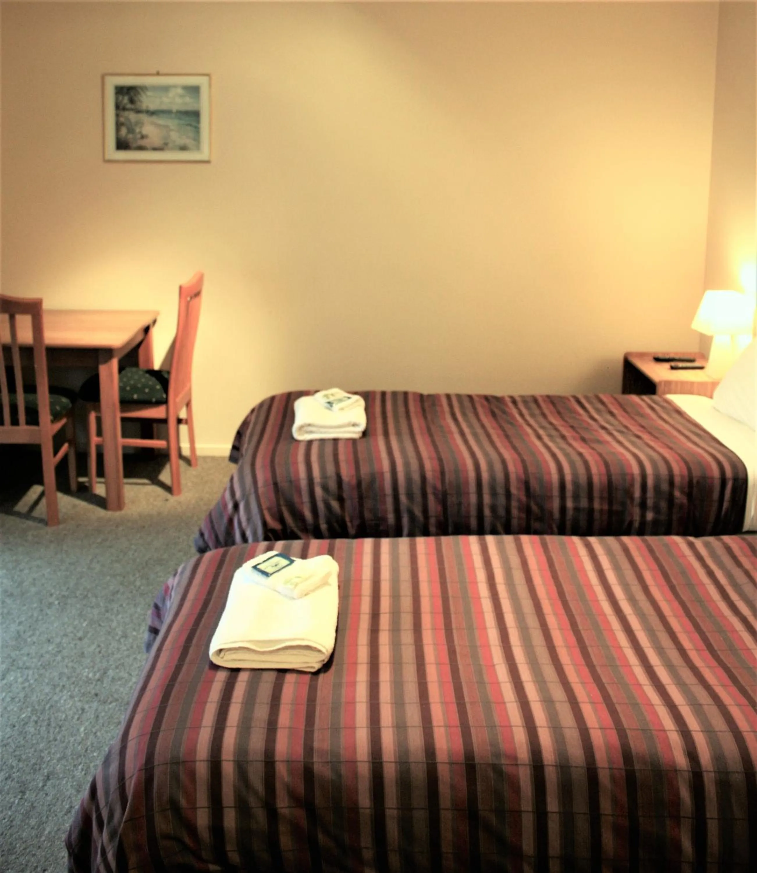 Bed in Owen River Tavern & Motels