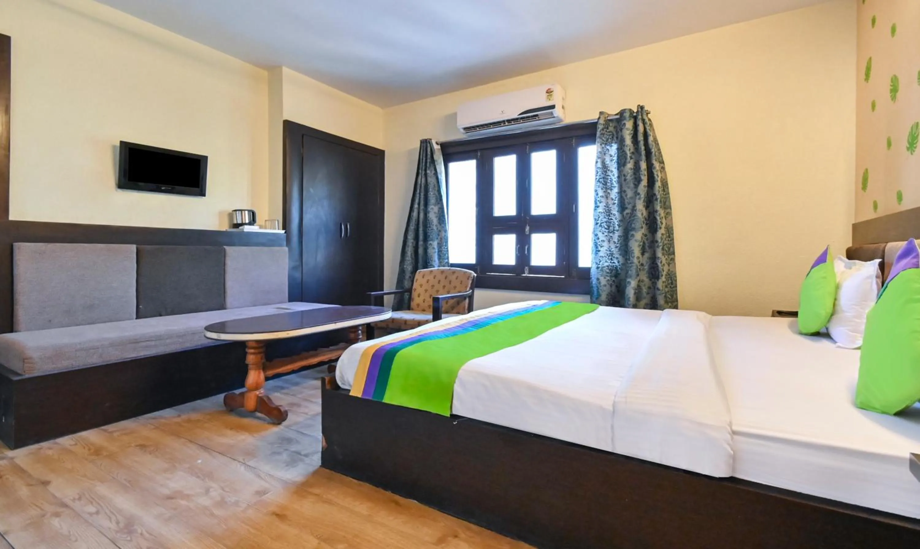 Bedroom, Bed in Treebo Siddharth