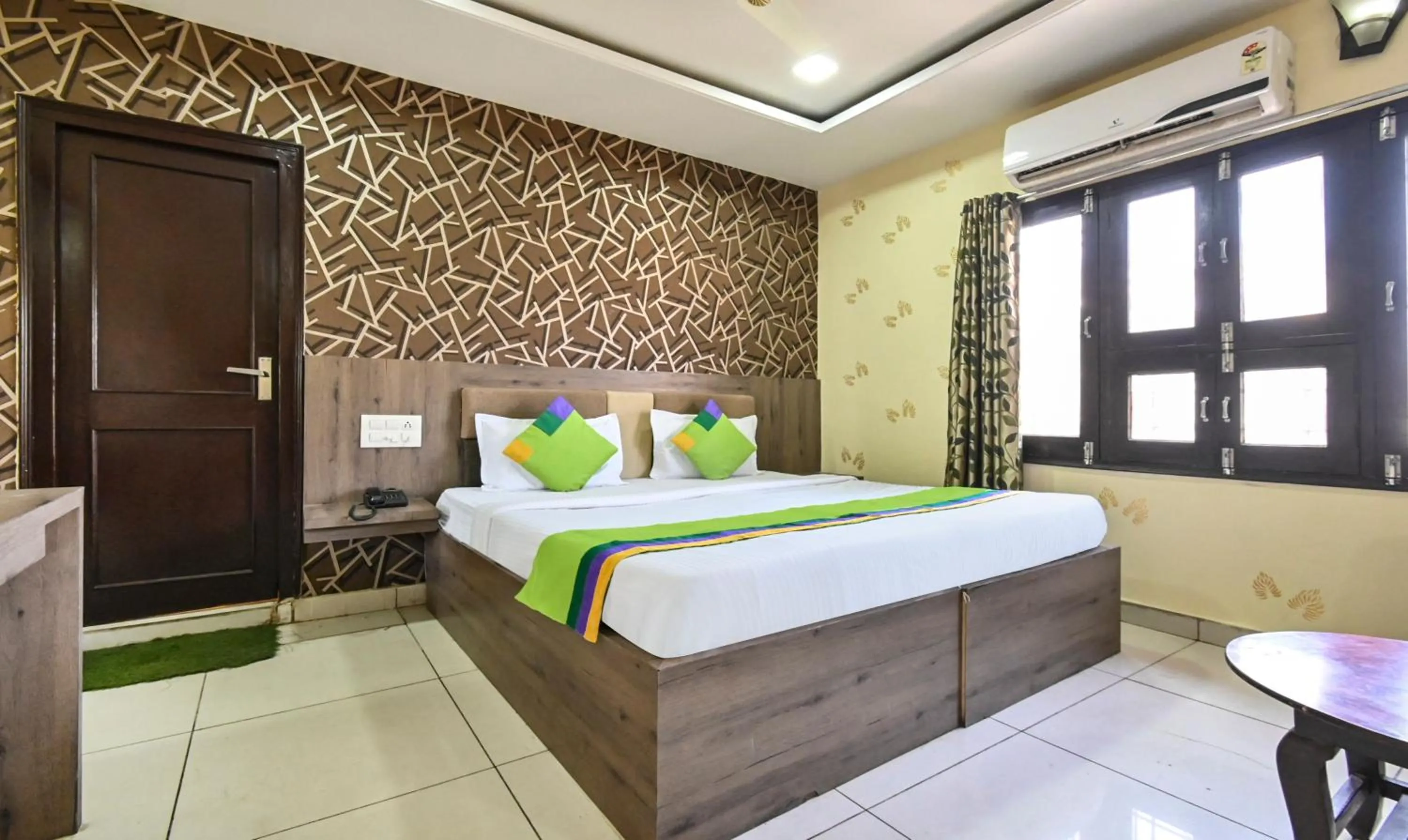 Bedroom, Bed in Treebo Siddharth