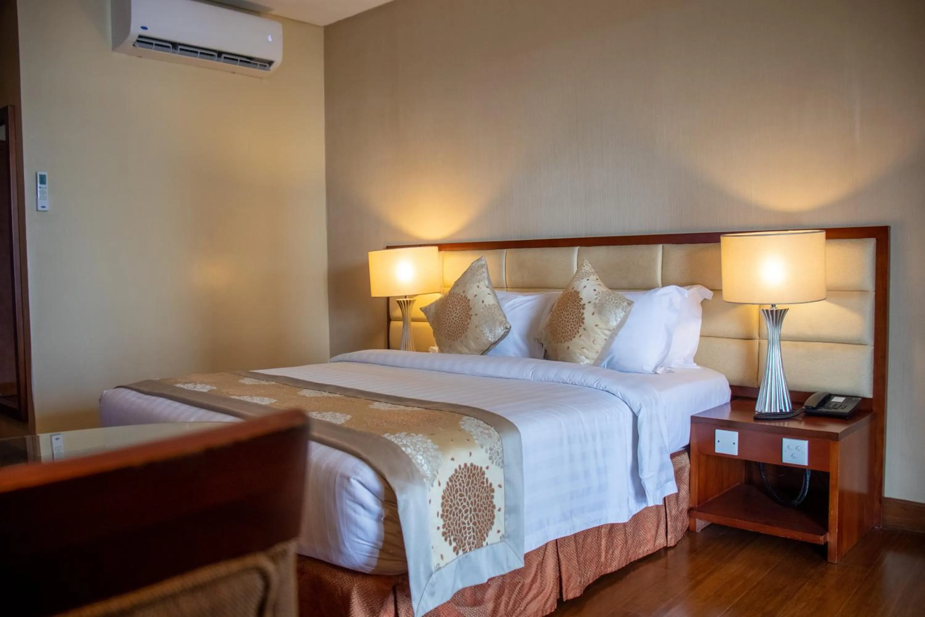 Bed in The Avenue Plaza Hotel