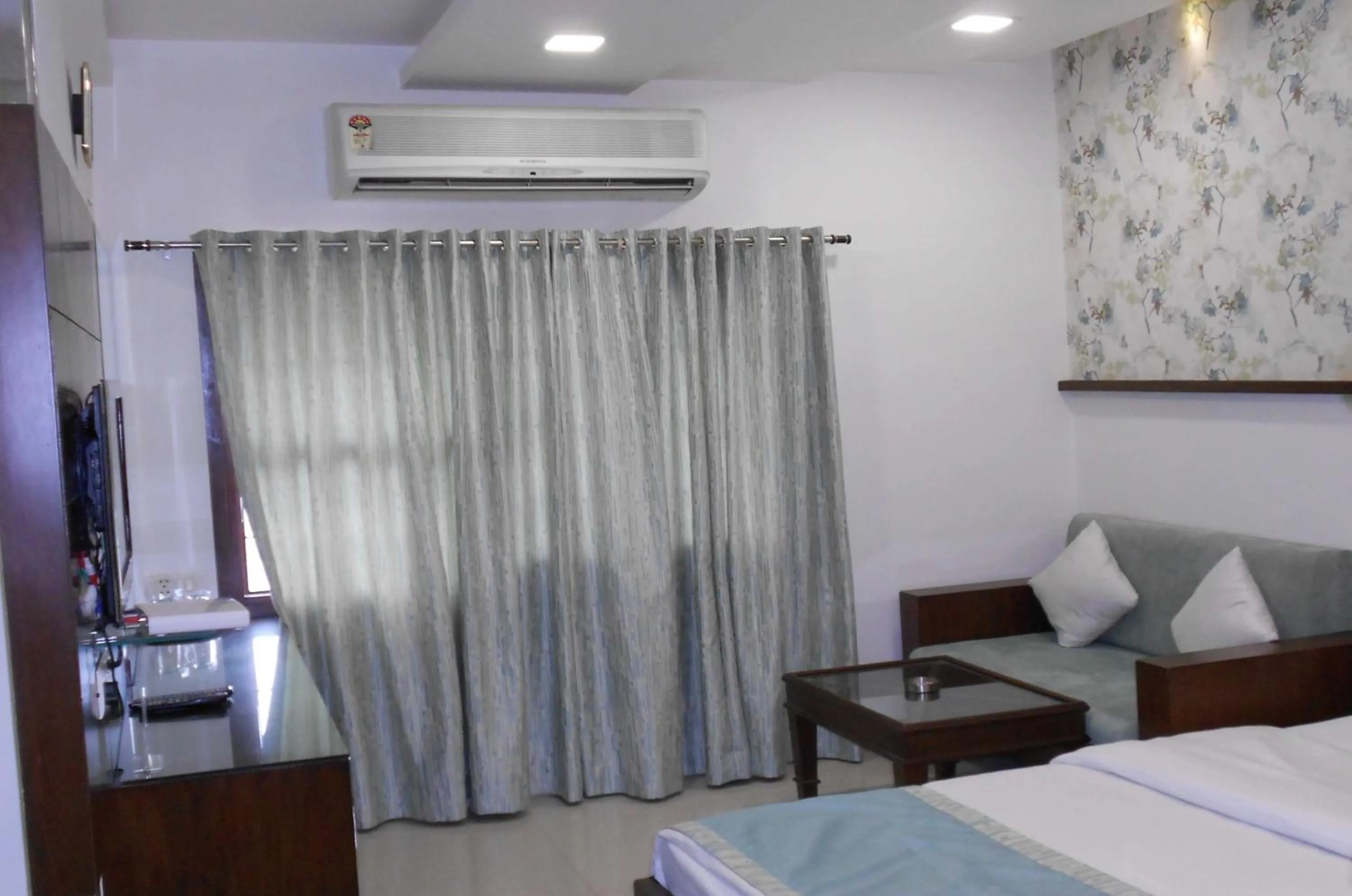 Seating area, Bed in Hotel Annapoorna Residency