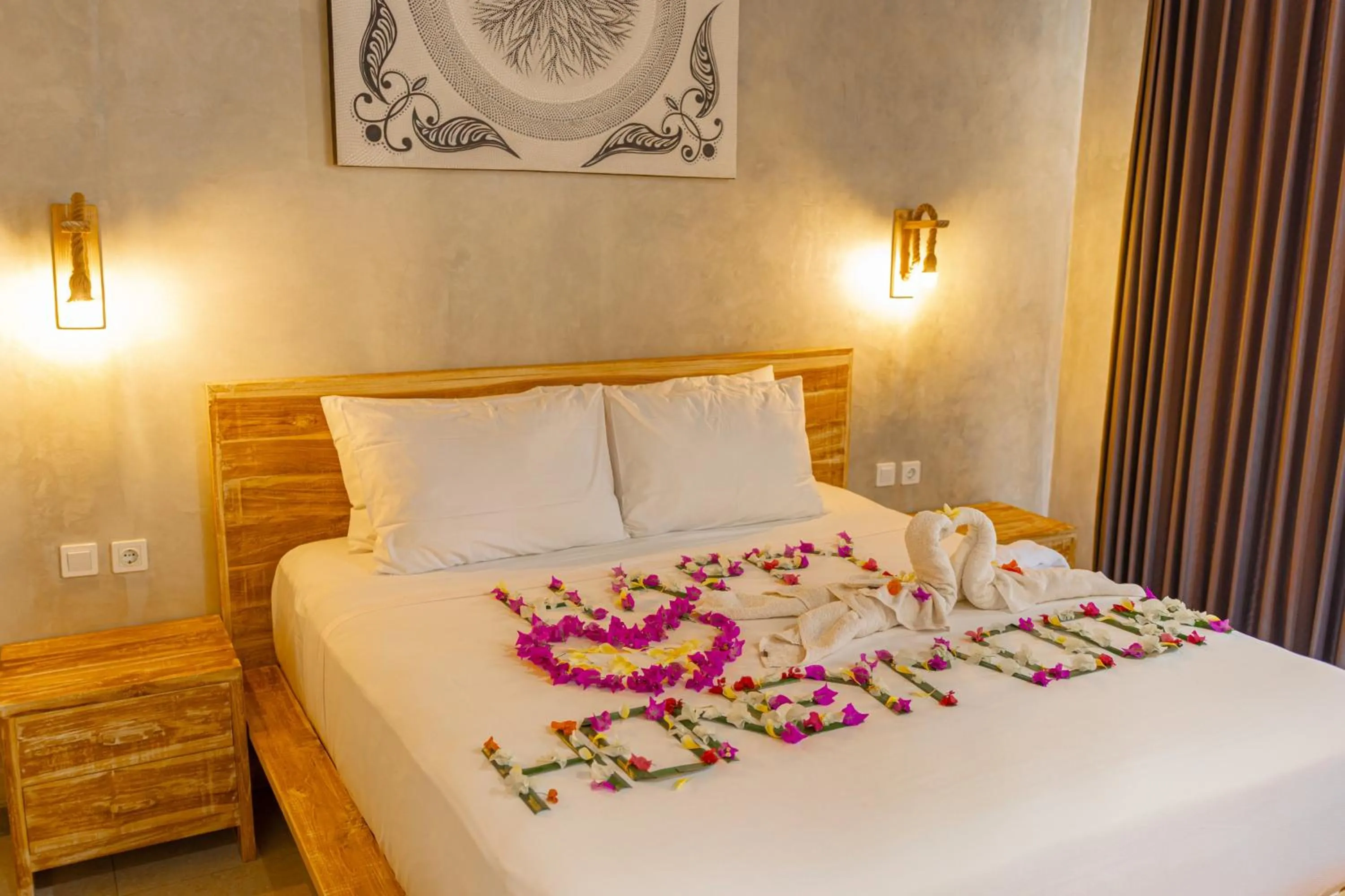 Bed in Golden Garuda Cottages