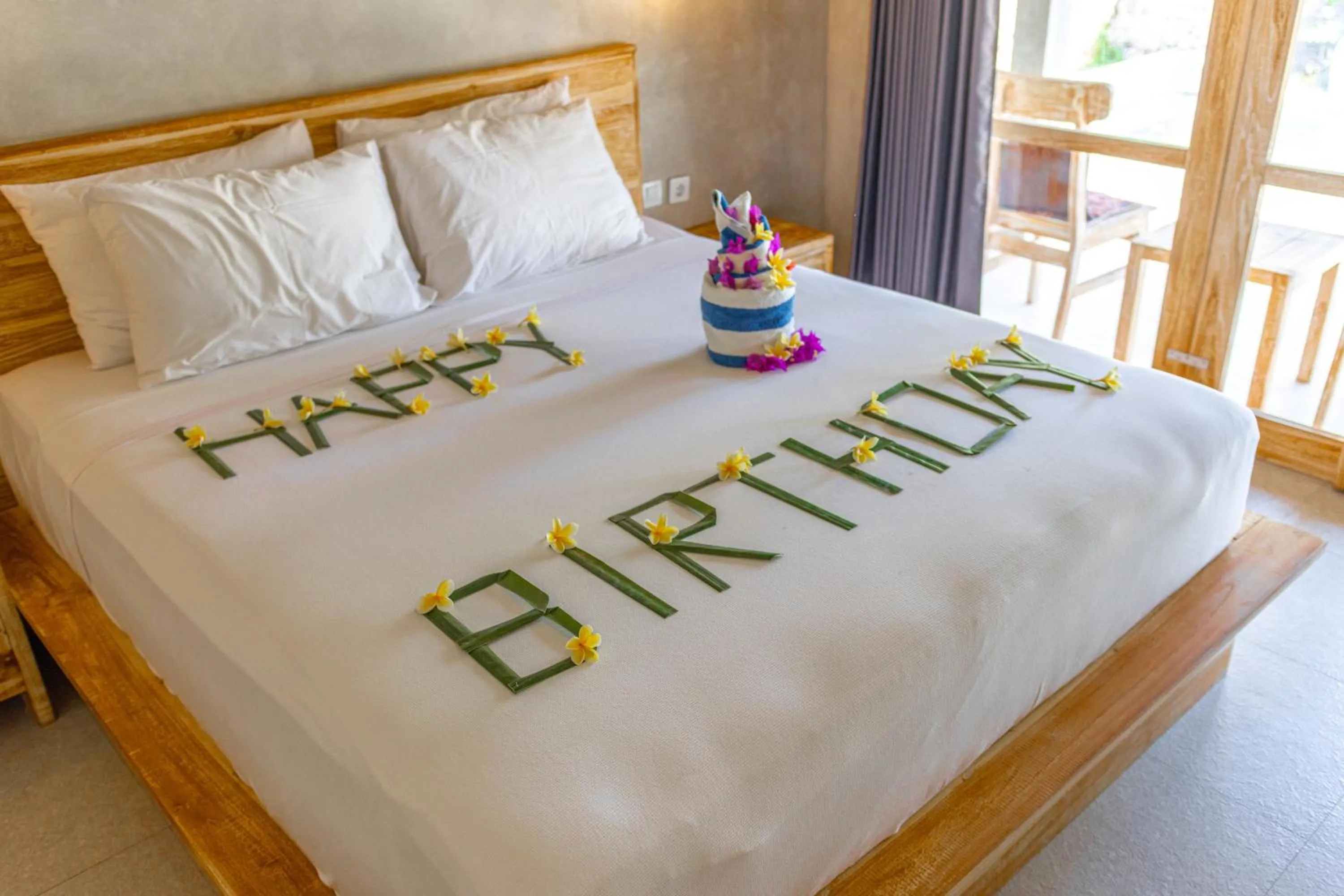 Bed in Golden Garuda Cottages