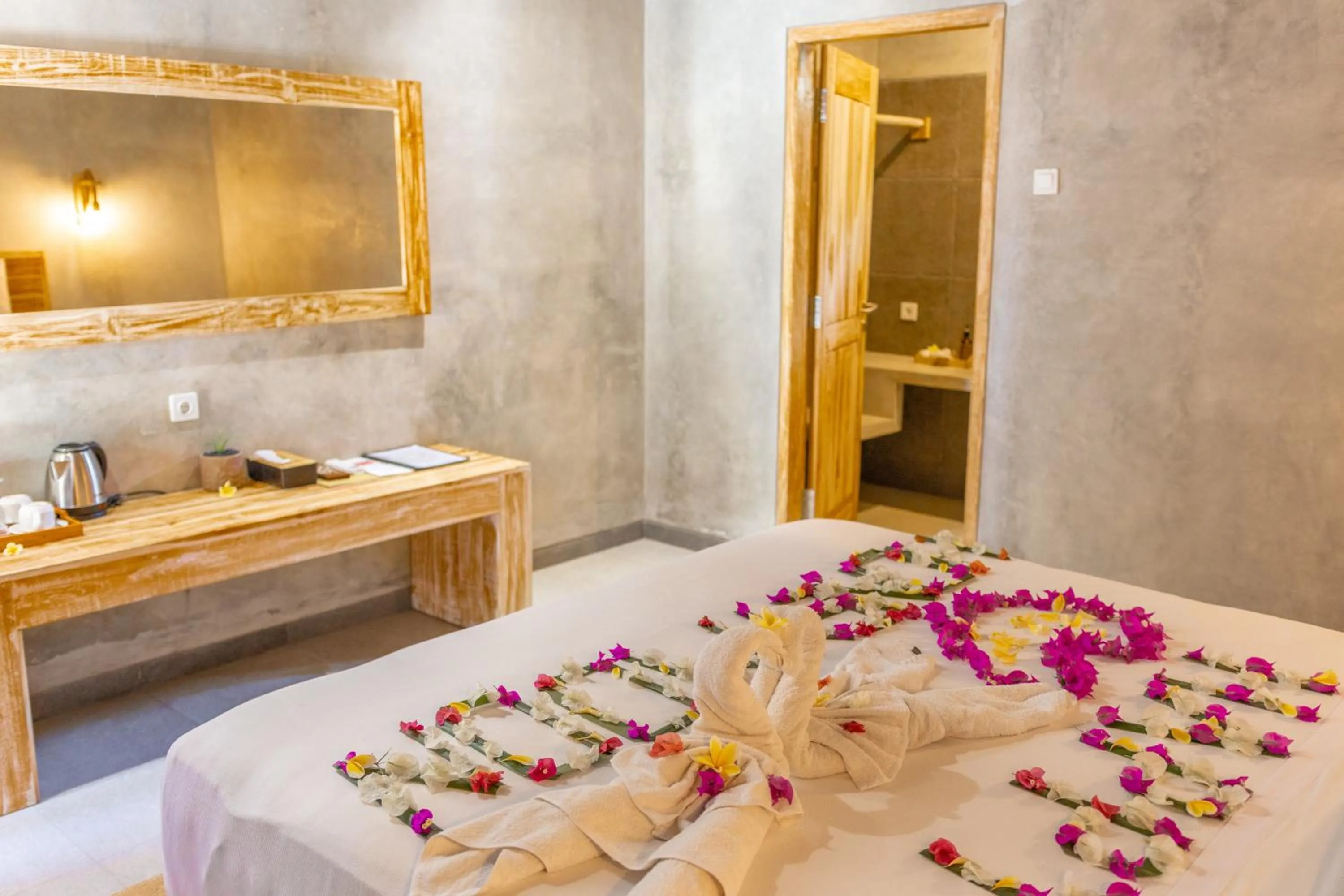 Bed in Golden Garuda Cottages