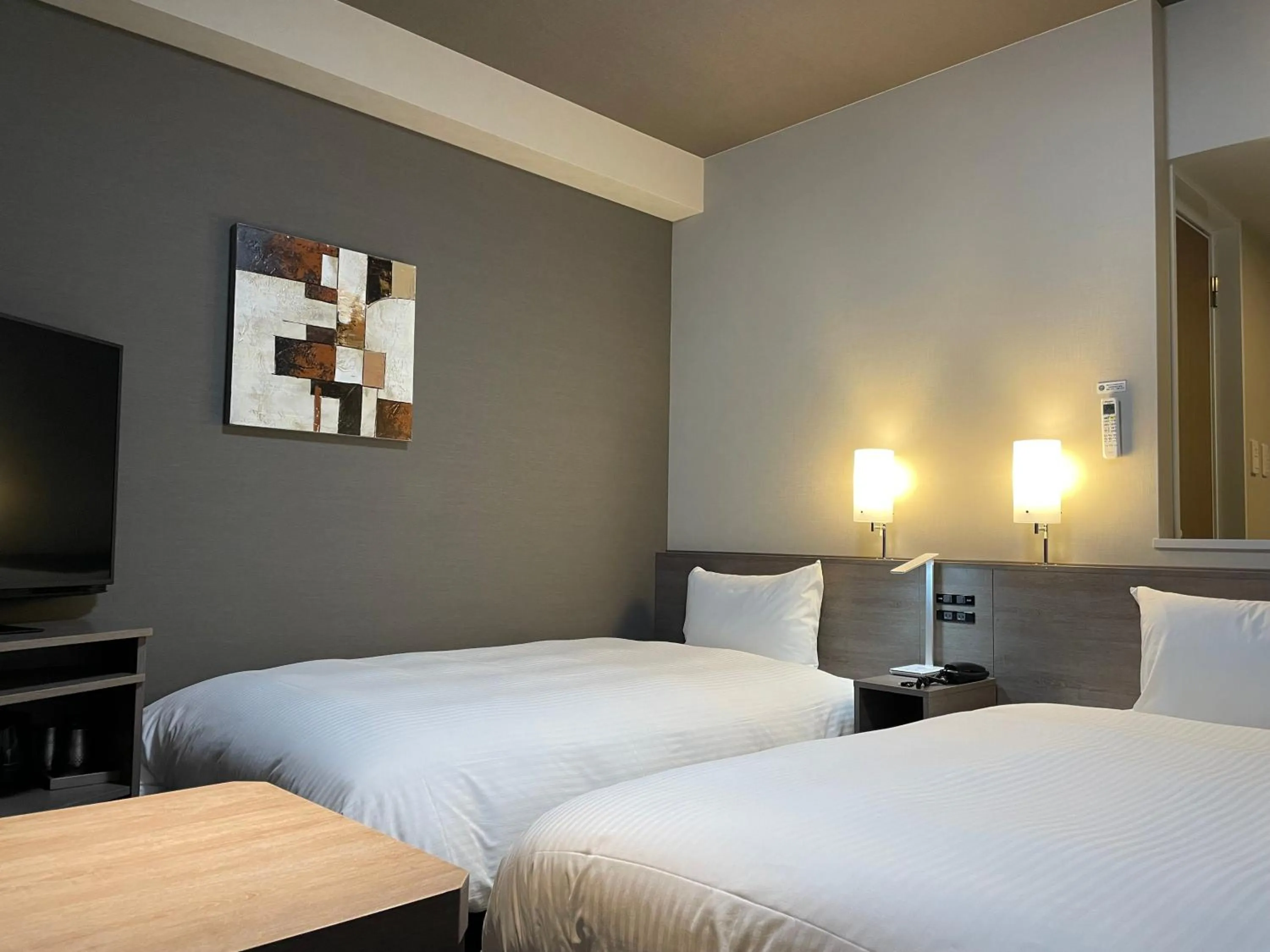 Photo of the whole room, Bed in Hotel Route Inn Shikoku Chuo