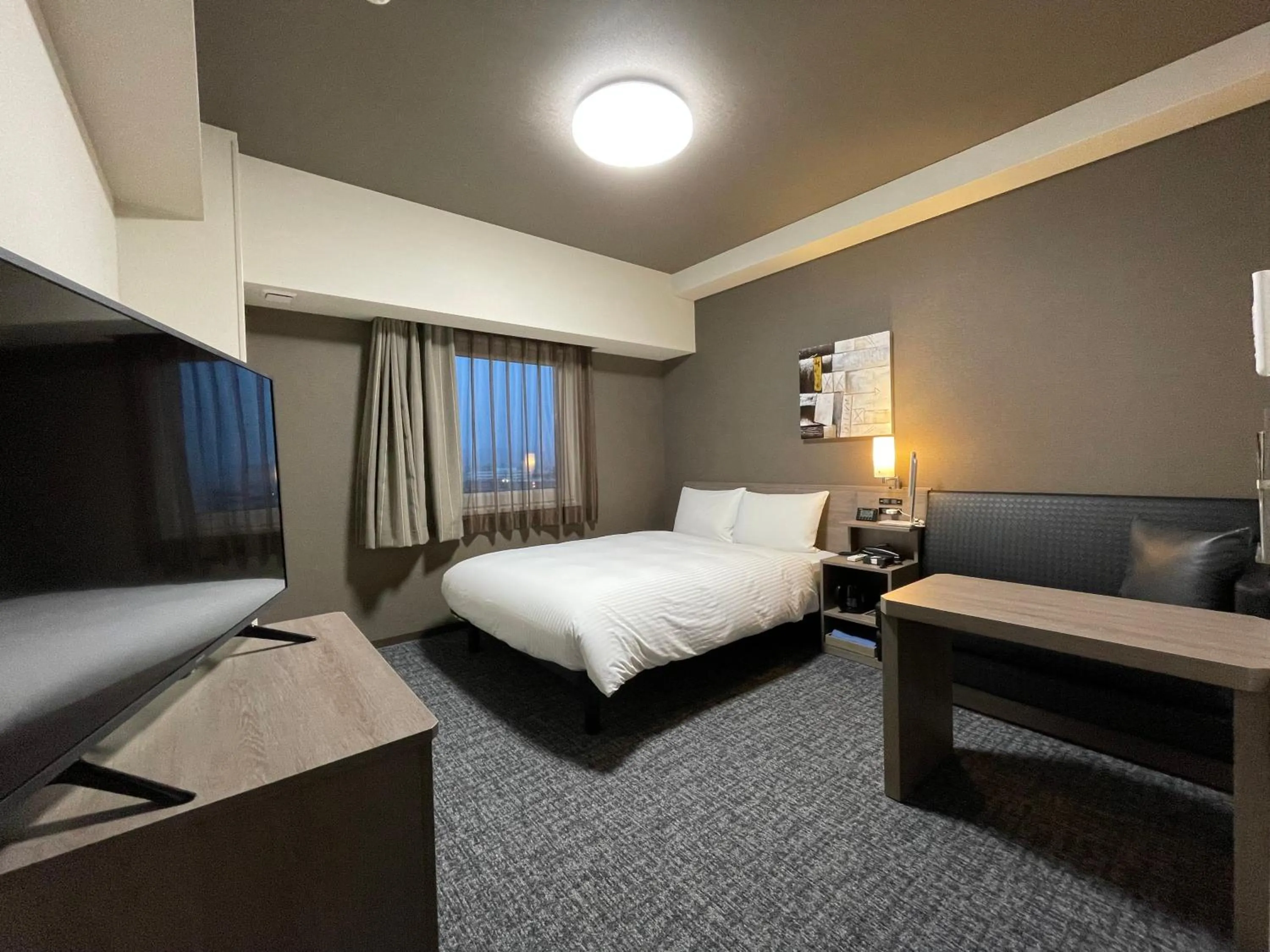Photo of the whole room, Bed in Hotel Route Inn Mitsuke -Nakanoshima Mitsuke Inter-